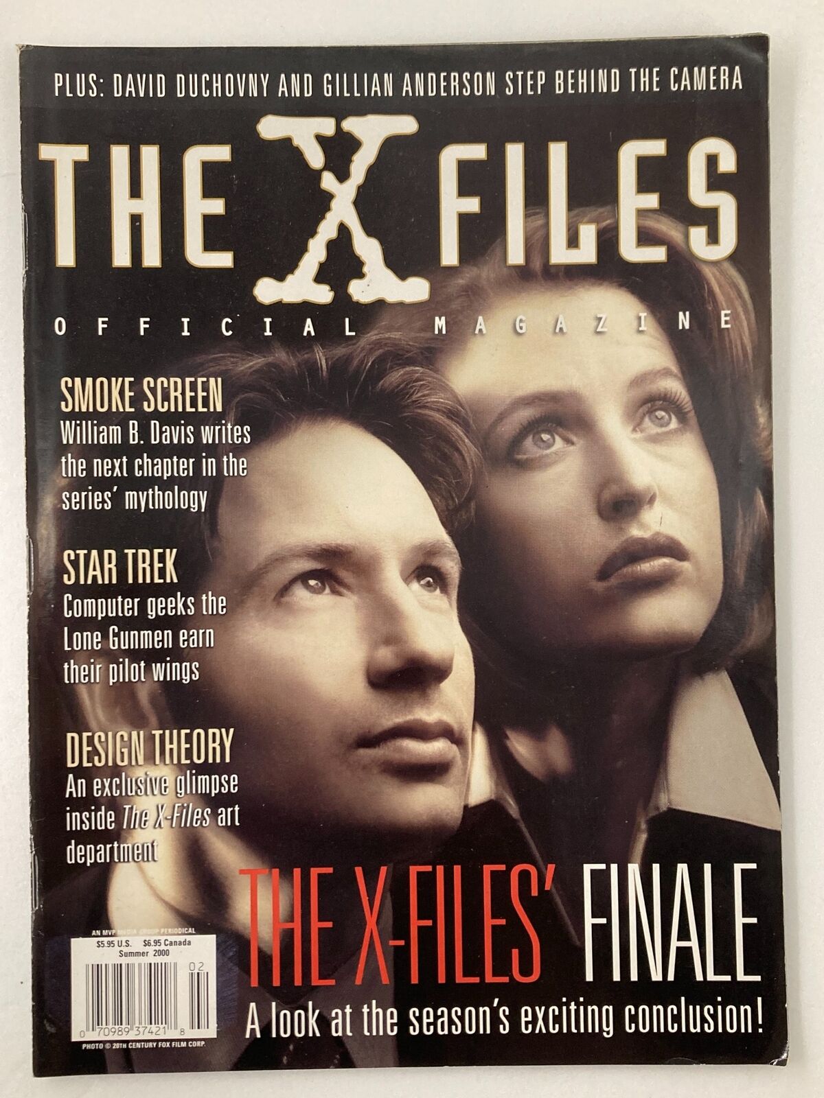 The X-Files Magazine Summer 2000 featuring Gillian Anderson and David Duchovny on the cover, showcasing their roles as Mulder and Scully with a captivating design, perfect for collectors of vintage TV memorabilia.