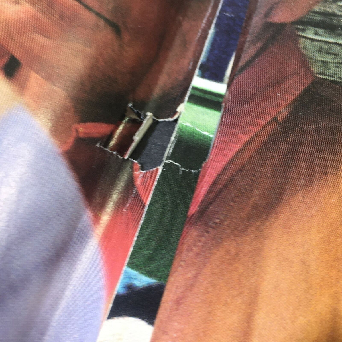 Close-up of an interior page from Cycle World Magazine May 1999 showing an advertisement featuring cowboys.