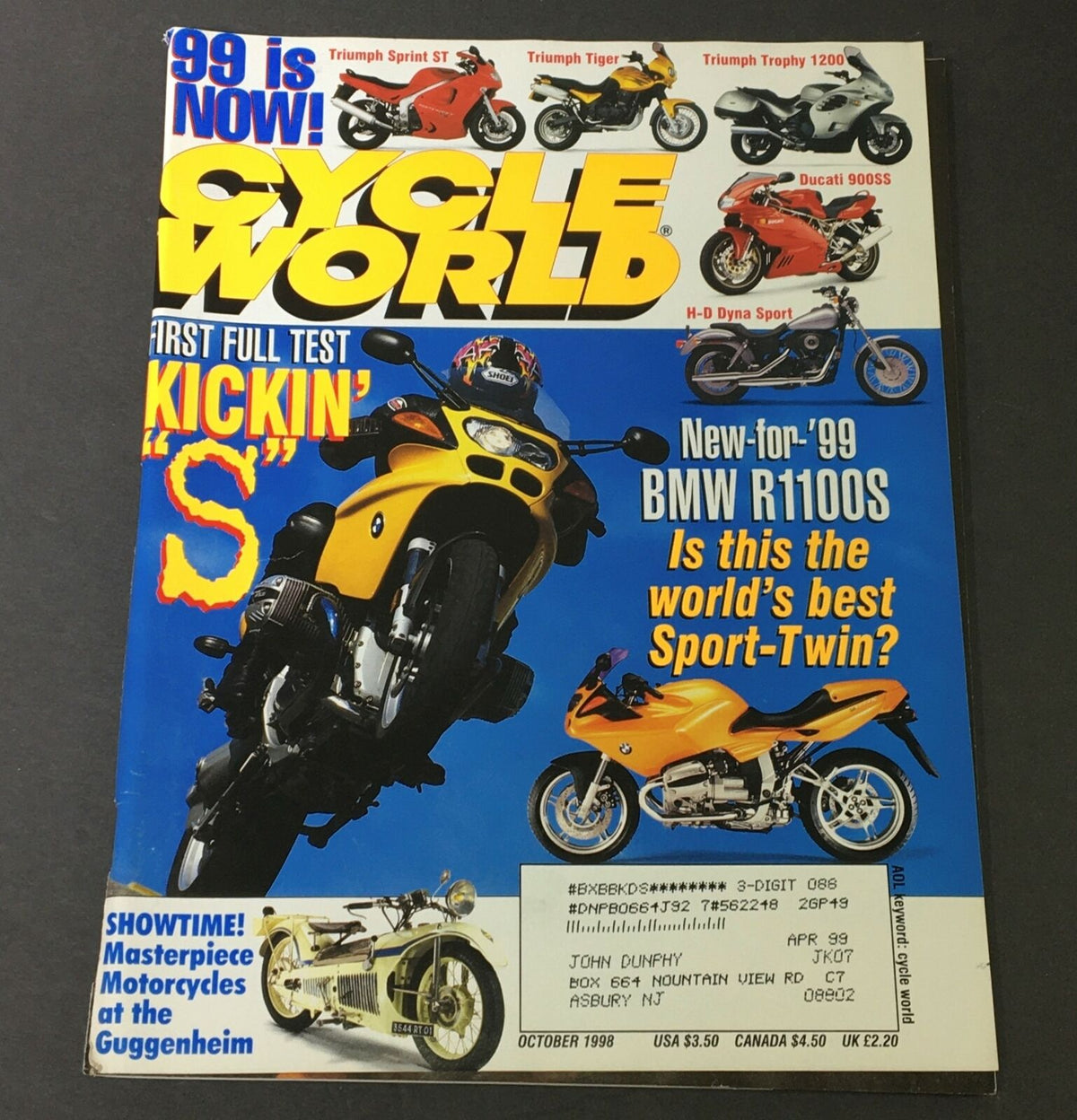 Cycle World Magazine October 1998 cover featuring Triumph Sprint ST, Tiger, Trophy 1200, and BMW R1100S with bold text and motorcycle images.