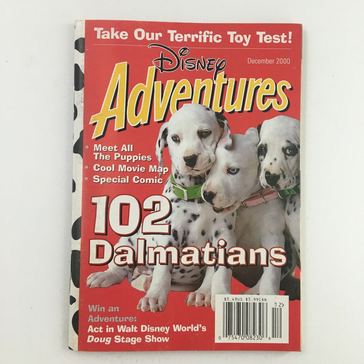 Cover of Disney Adventures Magazine December 2000 featuring The 102 Dalmatians, showcasing adorable Dalmatian puppies, colorful graphics, and details about fun activities, making it a nostalgic collectible.