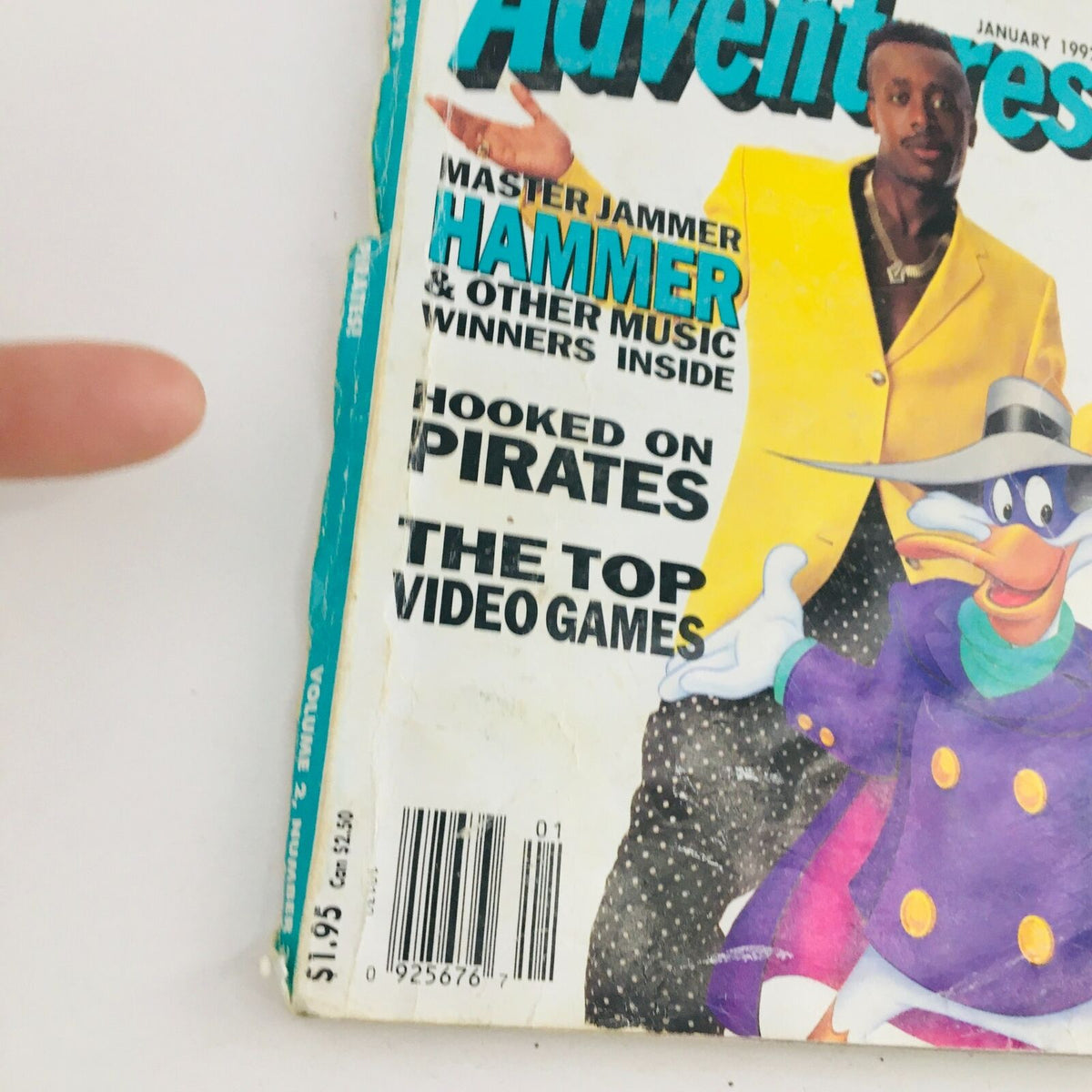 Close-up of Disney Adventures Magazine January 1992 cover, highlighting Master Jammer MC Hammer and various features like 'Hooked on Pirates' and 'The Top Video Games'.