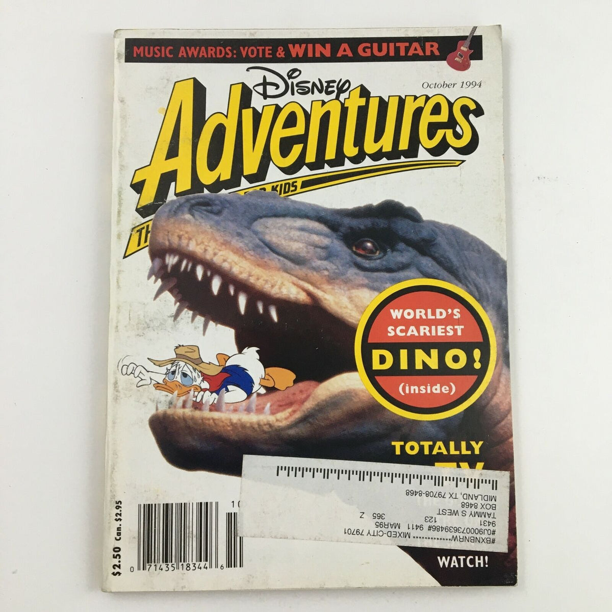 Cover of Disney Adventures Magazine from October 1994 featuring Donald Duck and the headline 'World's Scariest Dino'. The cover showcases a vibrant dinosaur illustration and Donald Duck in a playful pose, making it an iconic collectible for fans of vintage Disney magazines.