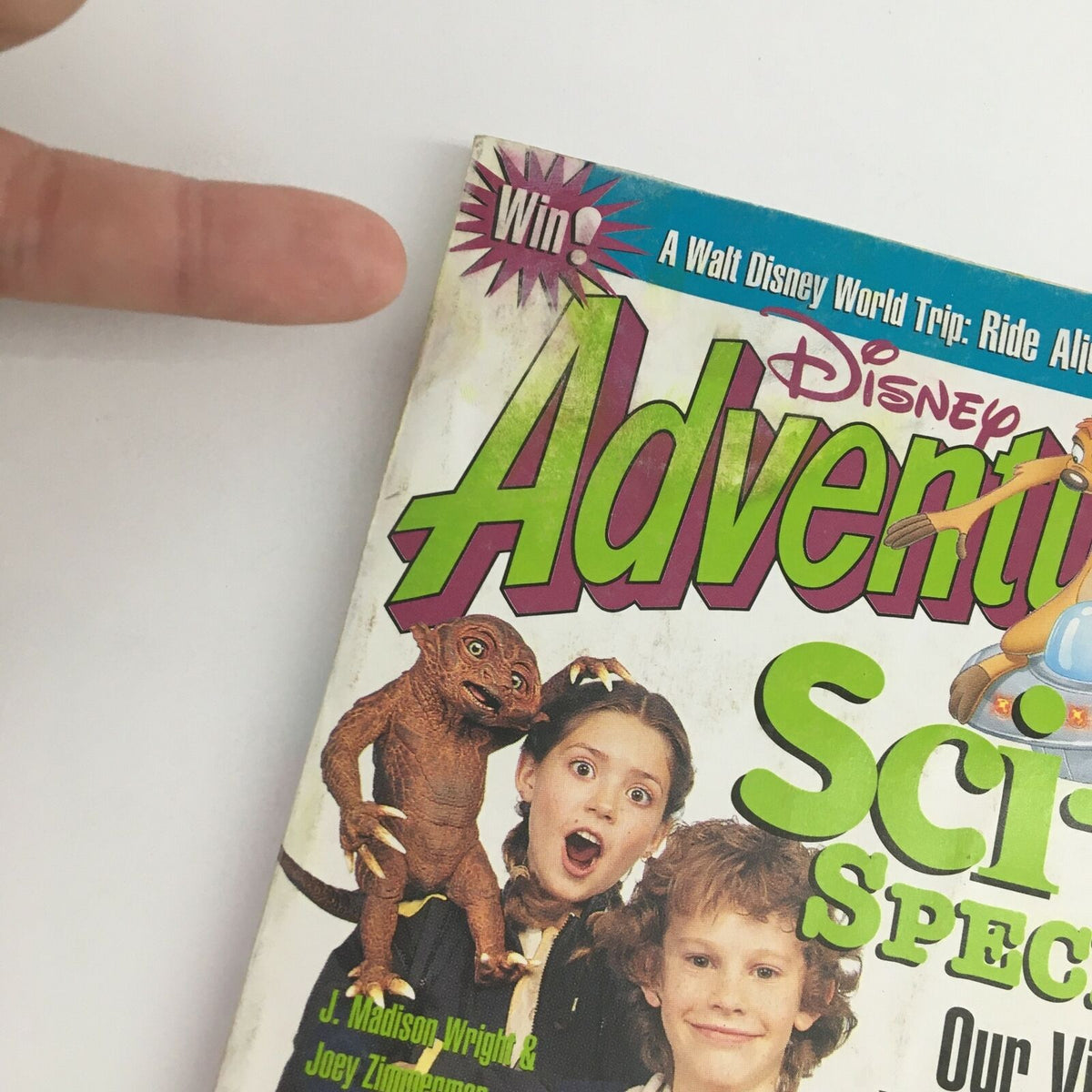 Close-up of Disney Adventures Magazine May 1995 cover highlighting the title 'Sci-Fi Special' with characters, offering a glimpse into the nostalgia of 1990s Disney.