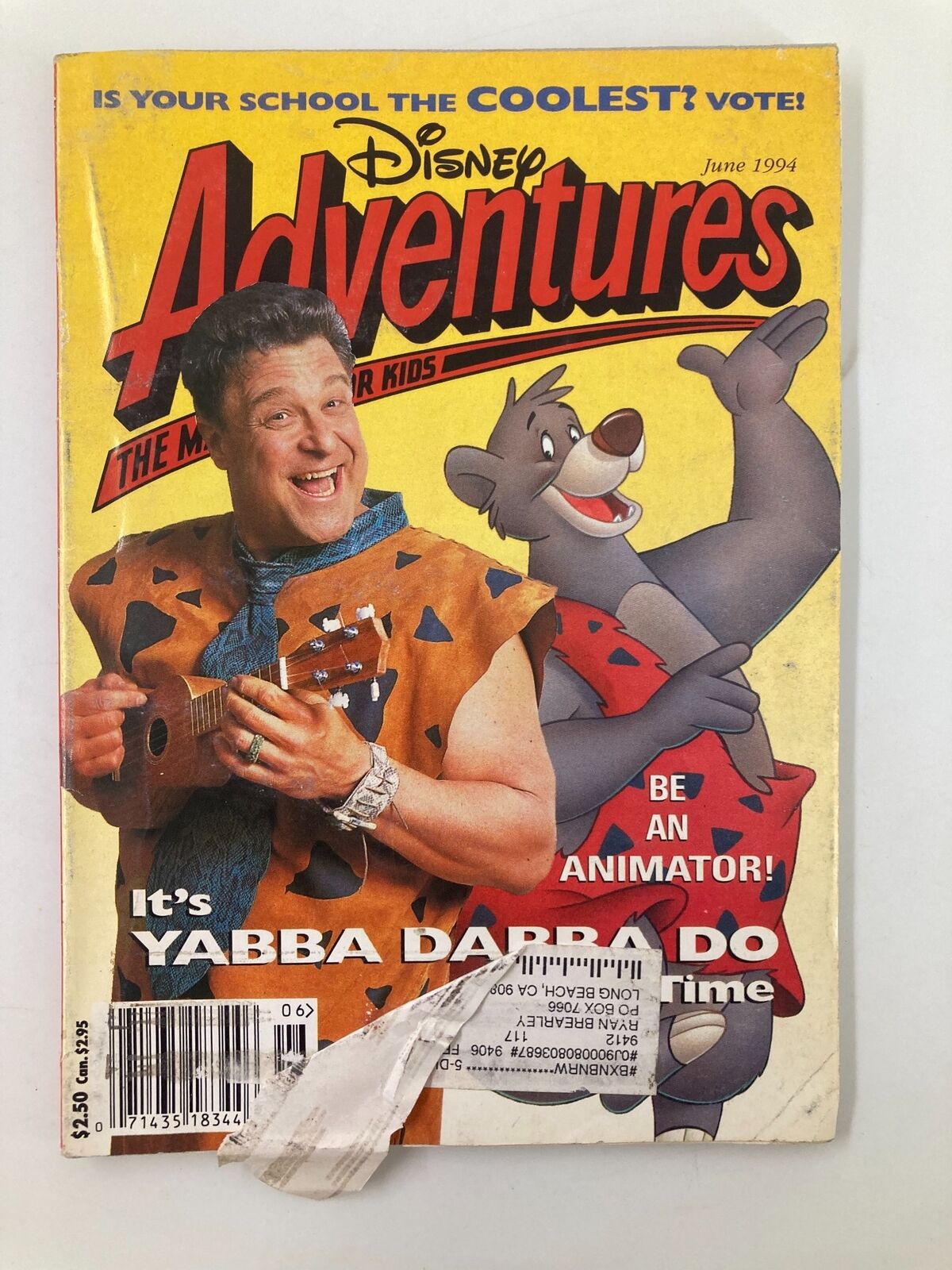 Disney Adventures Magazine June 1994 cover featuring John Goodman as Fred Flintstone alongside a cartoon bear. The vibrant cover highlights themes of animation and childhood nostalgia.