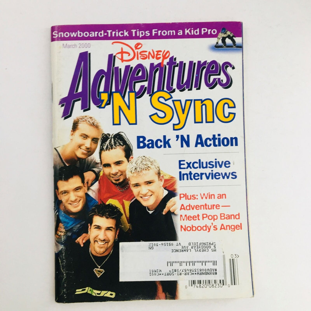 Cover of Disney Adventures Magazine from March 2000 featuring 'N Sync with the title 'Back 'N Action' and highlights on snowboard-trick tips.