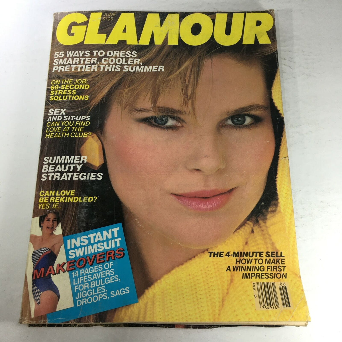 Cover of VTG Glamour Magazine June 1984 featuring a captivating image of a model. The magazine highlights articles on summer beauty strategies, swimwear makeovers, and stress solutions, underscoring the fashion and lifestyle trends of the 1980s.