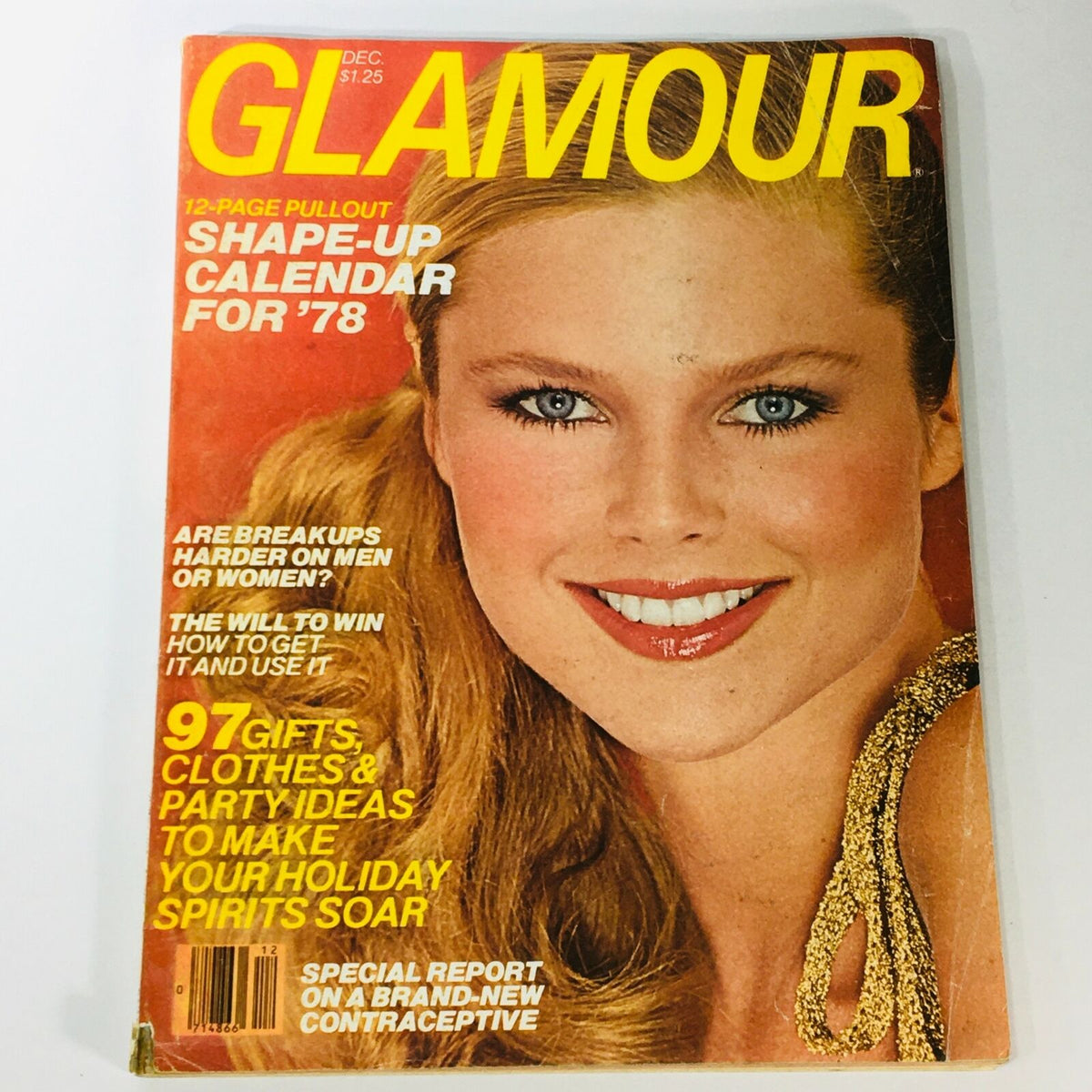 VTG Glamour Magazine December 1977 featuring Christie Brinkley on the cover with a Shape-Up Calendar pull-out. The cover highlights vibrant fashion trends of the late 1970s.