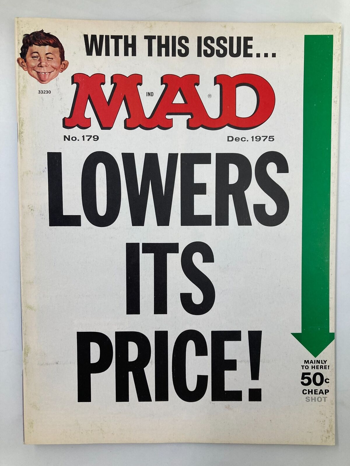 Mad Magazine December 1975 No. 179 cover featuring bold text 'LOWERS ITS PRICE!' and iconic logo, ideal for vintage magazine collectors.