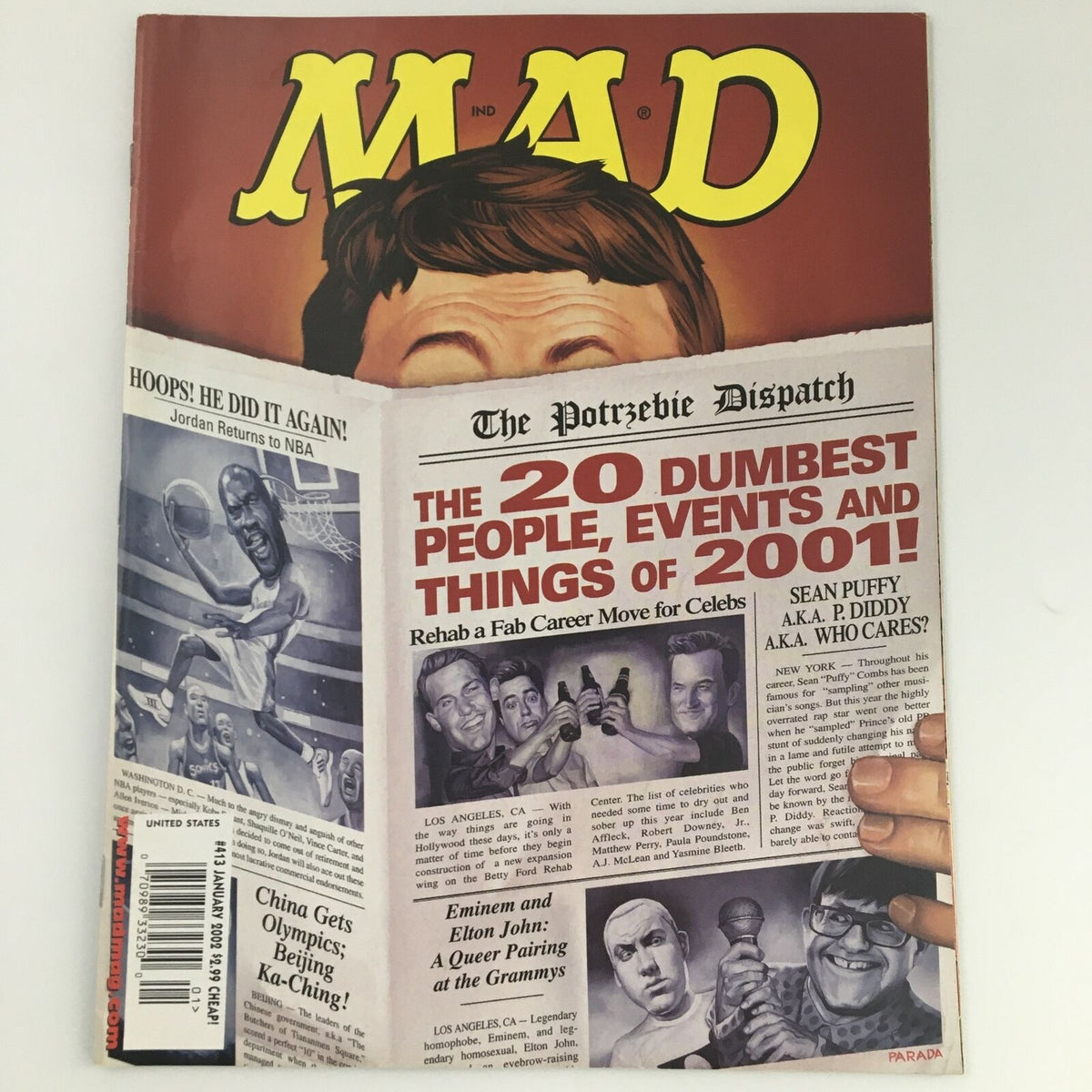 Mad Magazine January 2002 #413 featuring Eminem and Elton John on the cover, showcasing satirical humor and pop culture commentary from the early 2000s.