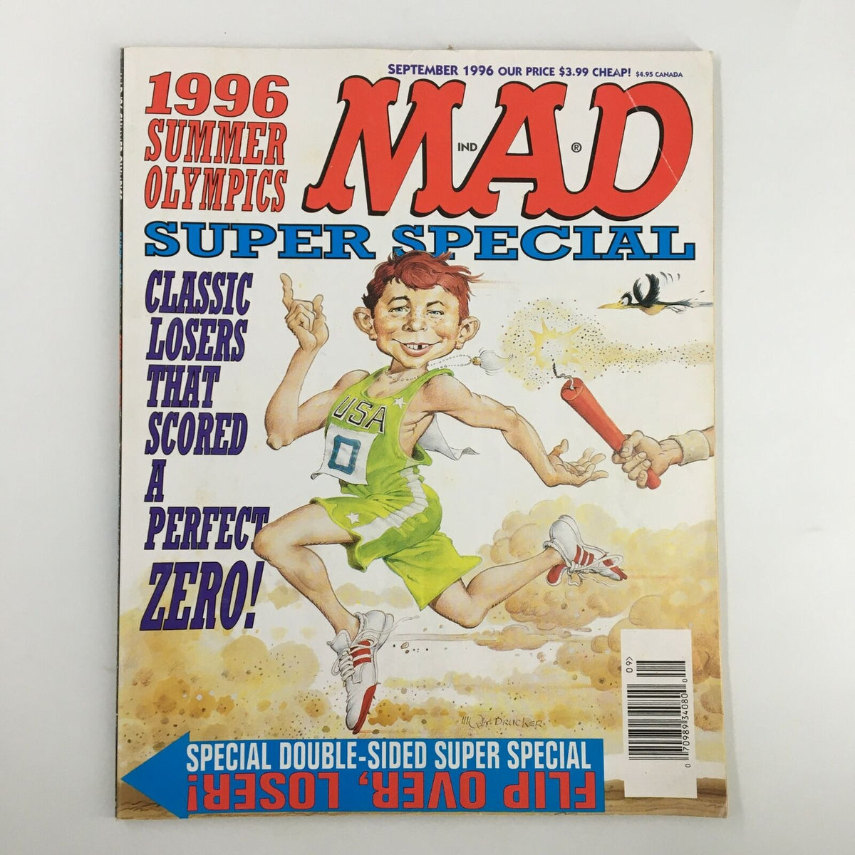 Cover of Mad Magazine September 1996, titled 'Mad Magazine September 1996 Special Flip-Over Olympics & Politics FN Fine 6.0'. Features a cartoon drawing of a boy in a green tracksuit celebrating the Olympics, with whimsical text highlighting Olympic themes and humor.