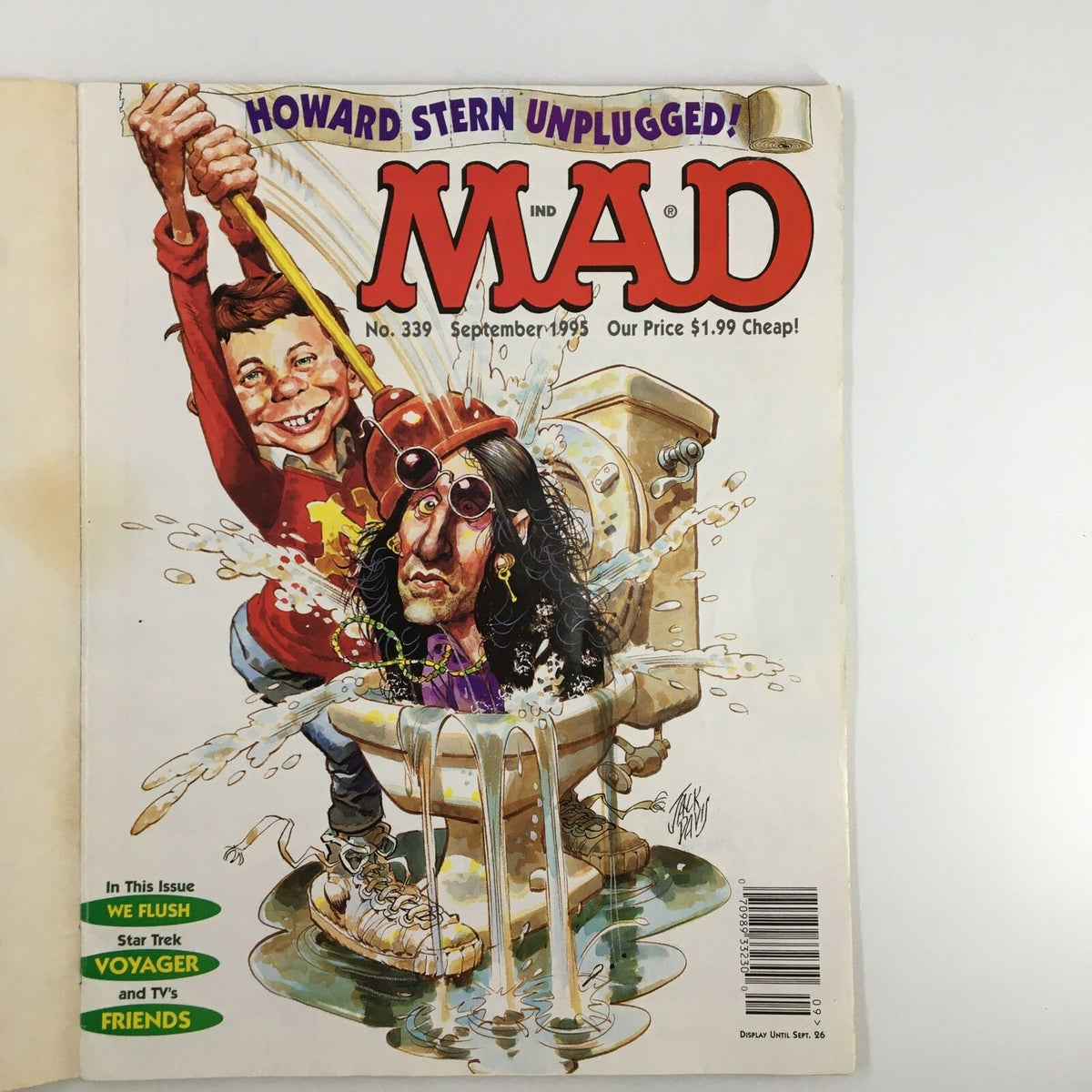 Mad Magazine September 1995 No. 339 cover featuring Howard Stern Unplugged, showcasing a humorous illustration with a character in a toilet surrounded by water, embodying the magazine's iconic satire style.