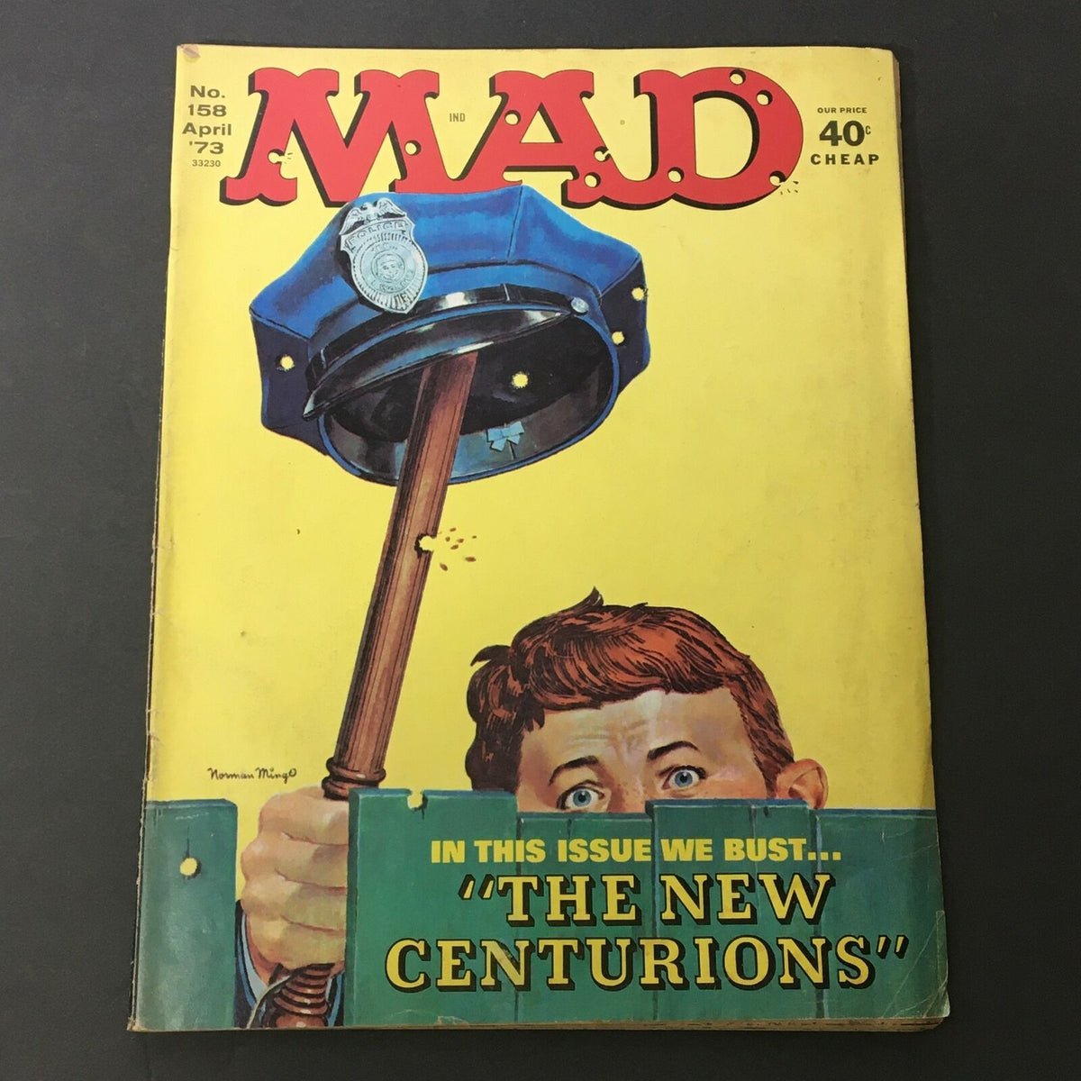 Cover of Mad #158 from April 1973 featuring the iconic Alfred E. Neuman and a humorous depiction of law enforcement, highlighting the theme 'The New Centurions'.