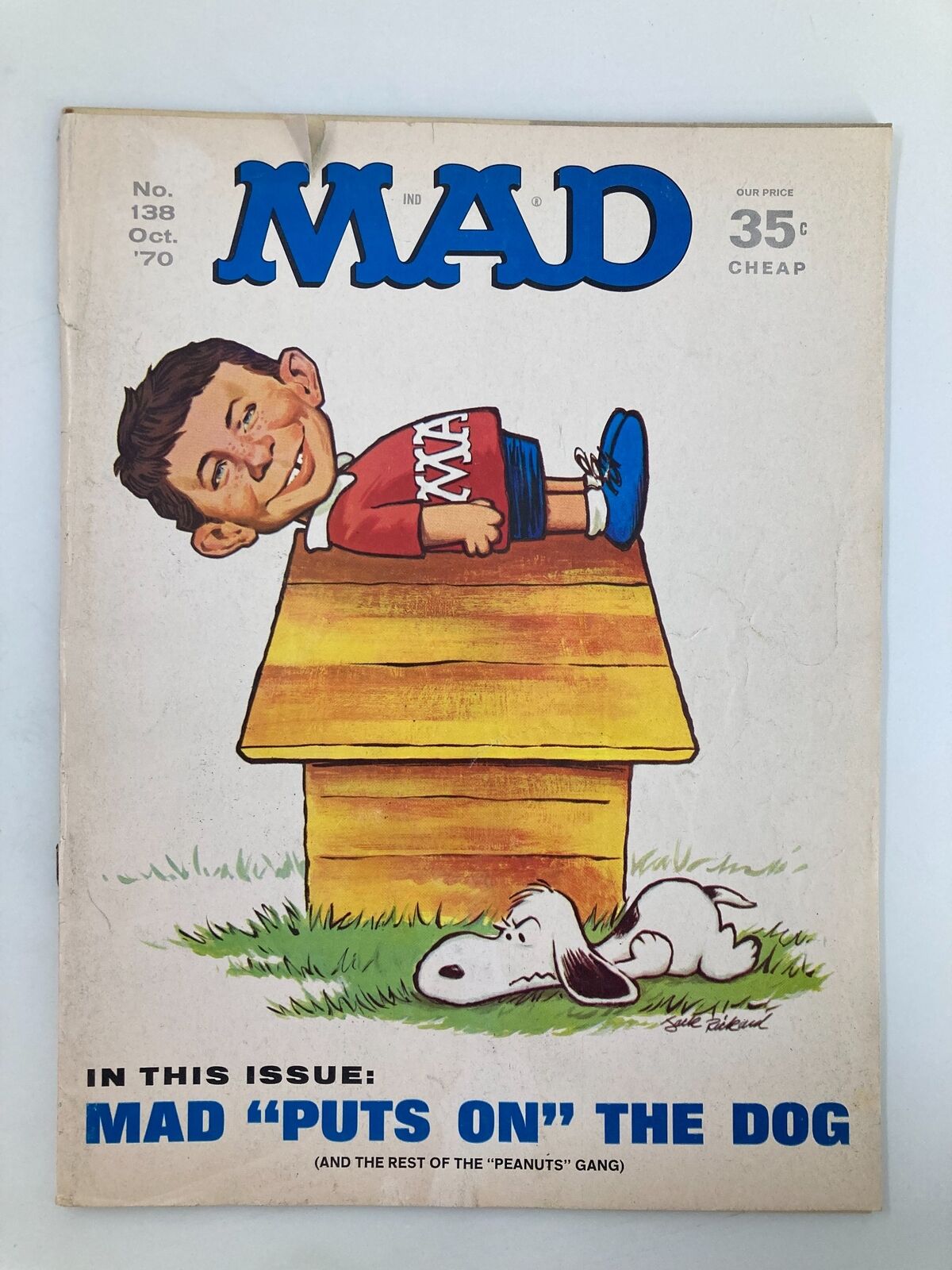 Cover of Mad Magazine October 1970 No. 138 featuring a cartoon character resembling Alfred E. Neuman lying on a doghouse with Snoopy lying nearby, showcasing vintage humor and nostalgic pop culture.