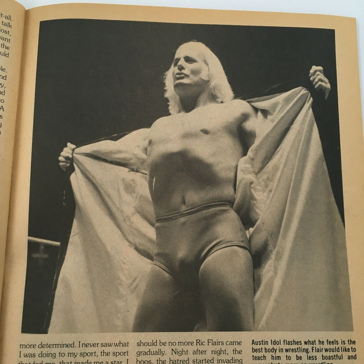 Image of a professional wrestler from WWF The Wrestler Magazine June 1980, showcasing a moment from the Jim Brunzell and Ray Stevens feud. The wrestler poses confidently with a dramatic expression, highlighting the excitement and theatricality of wrestling events from the era.