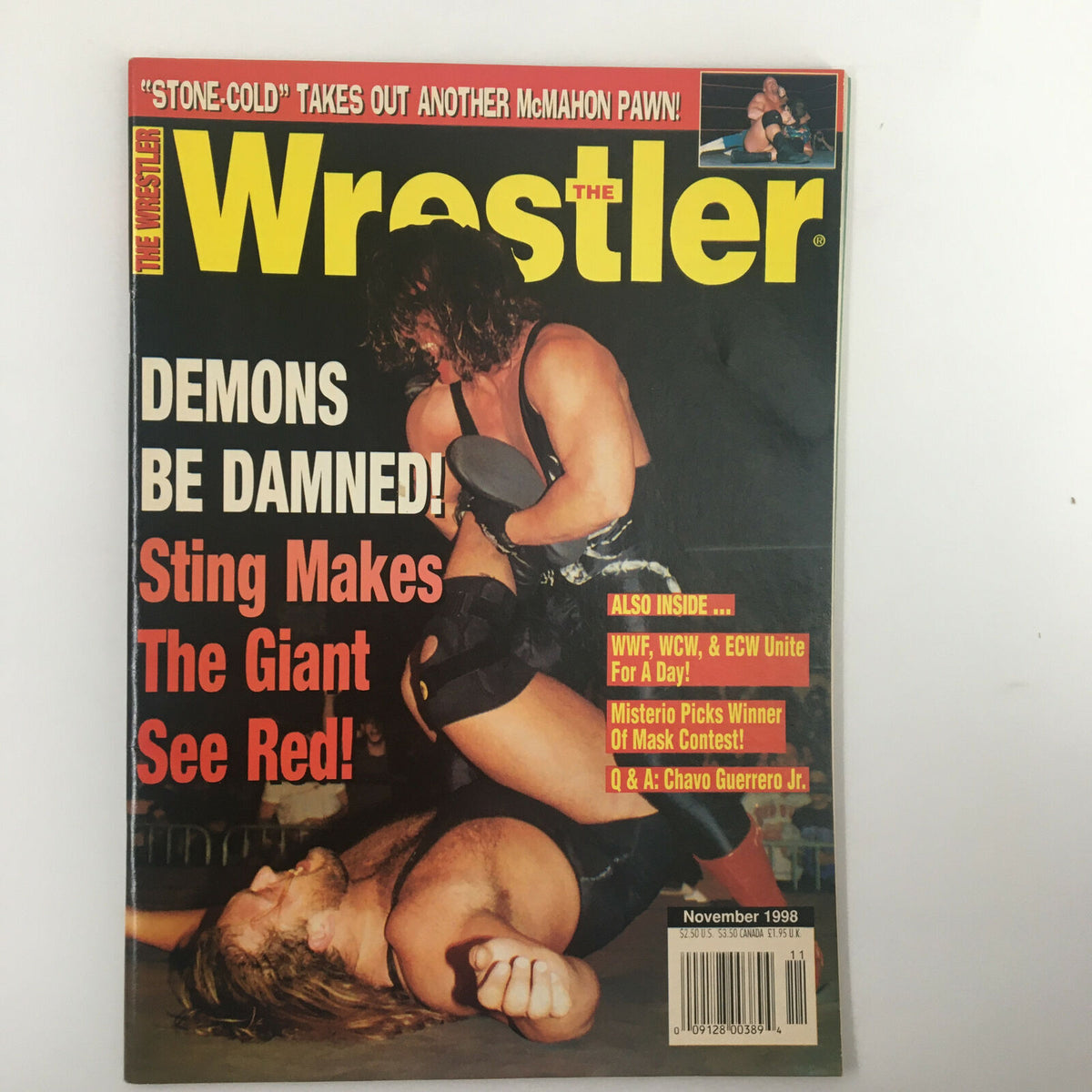 The Wrestler Magazine cover from November 1998, featuring a dramatic wrestling scene with two wrestlers in action, highlighting the title 'DEMONS BE DAMNED!' alongside the feature match of 'Steve Austin vs Vince McMahon'. The cover also includes additional stories about Sting and other wrestling events.