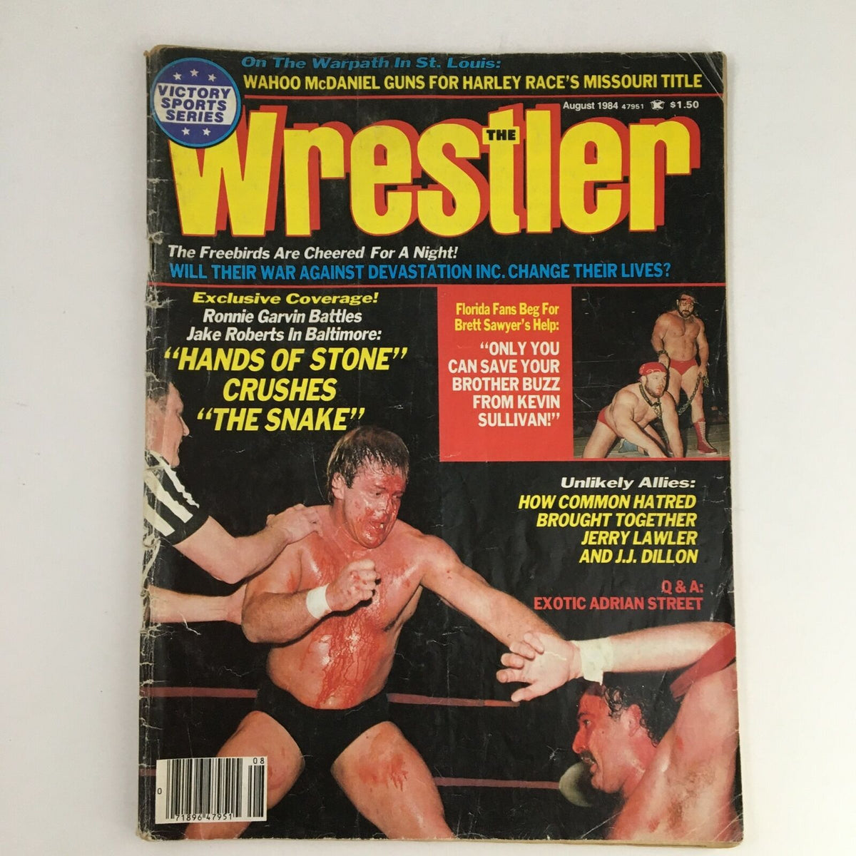 The Wrestler Magazine August 1984 cover featuring Ronnie Garvin and Jake Roberts, highlighting their intense wrestling match with bold headlines about their rivalry and other wrestling content.