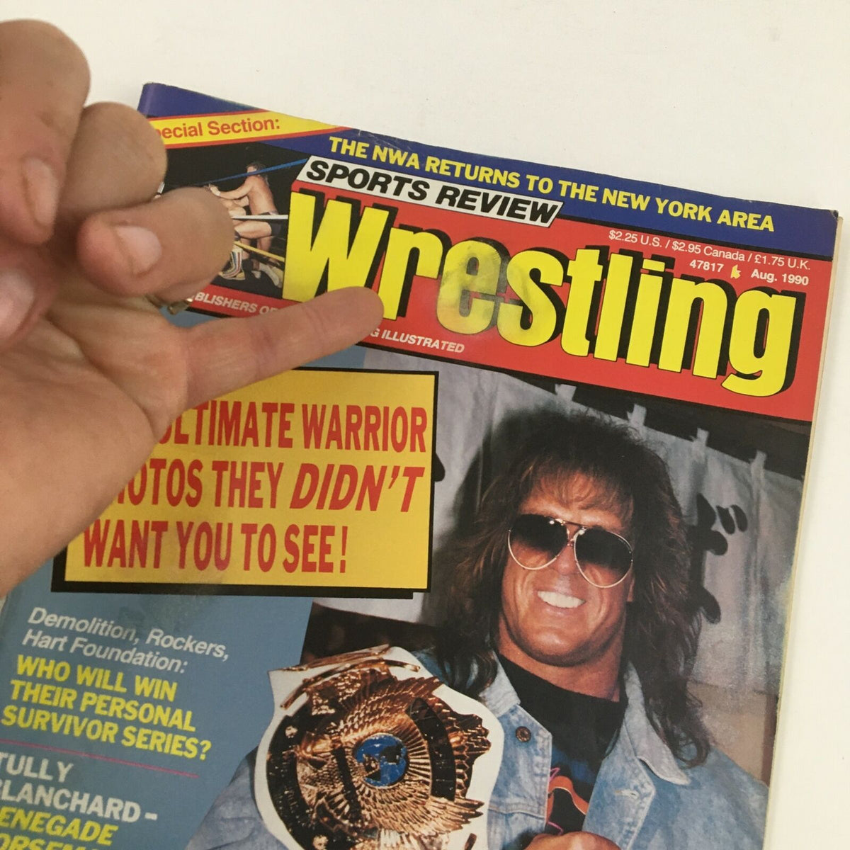 Detailed view of the Sports Review Wrestling Magazine August 1990 cover with Tully Blanchard, featuring a headline about unseen photos of The Ultimate Warrior.