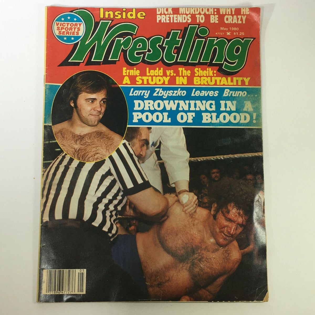 VTG Inside Wrestling Magazine May 1980 cover featuring Larry Zbyszko and Ernie Ladd vs The Sheik, showcasing the dramatic wrestling scene and vibrant design.