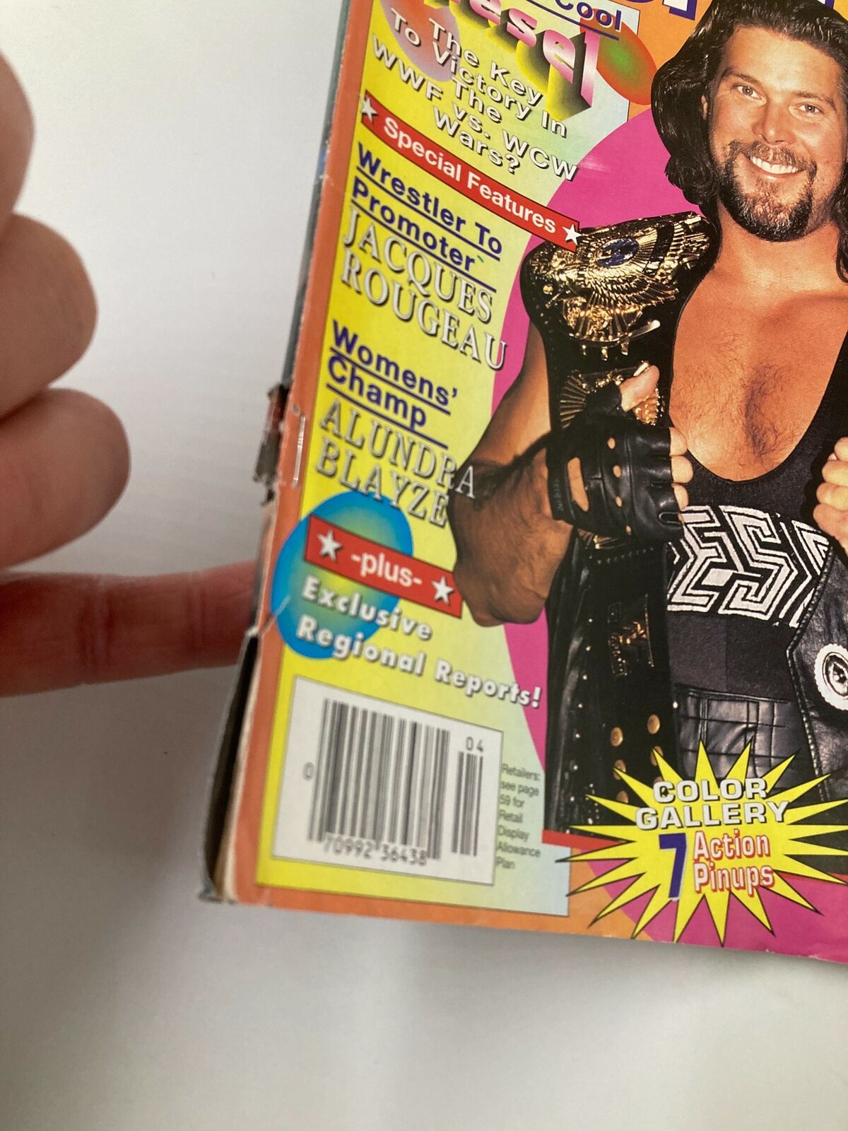Side view of the Wrestling World April 1996 magazine, highlighting the details of Big Daddy Cool Diesel, along with the issue's barcode and special features.