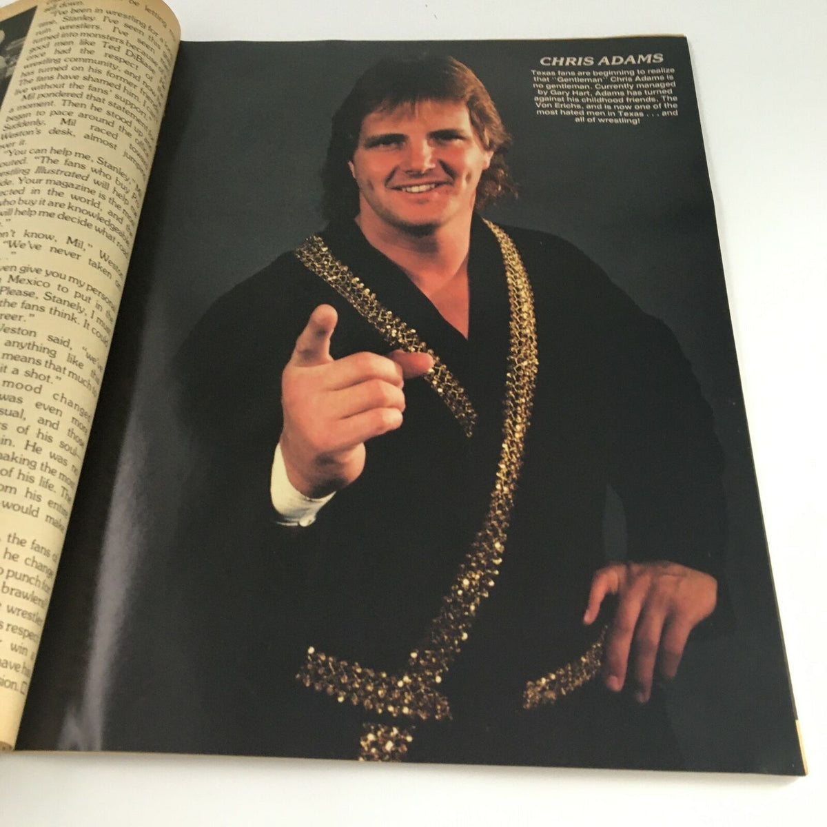 Chris Adams featured in Pro Wrestling Illustrated Magazine Spring 1985, showcasing his charismatic personality and iconic wrestling attire.