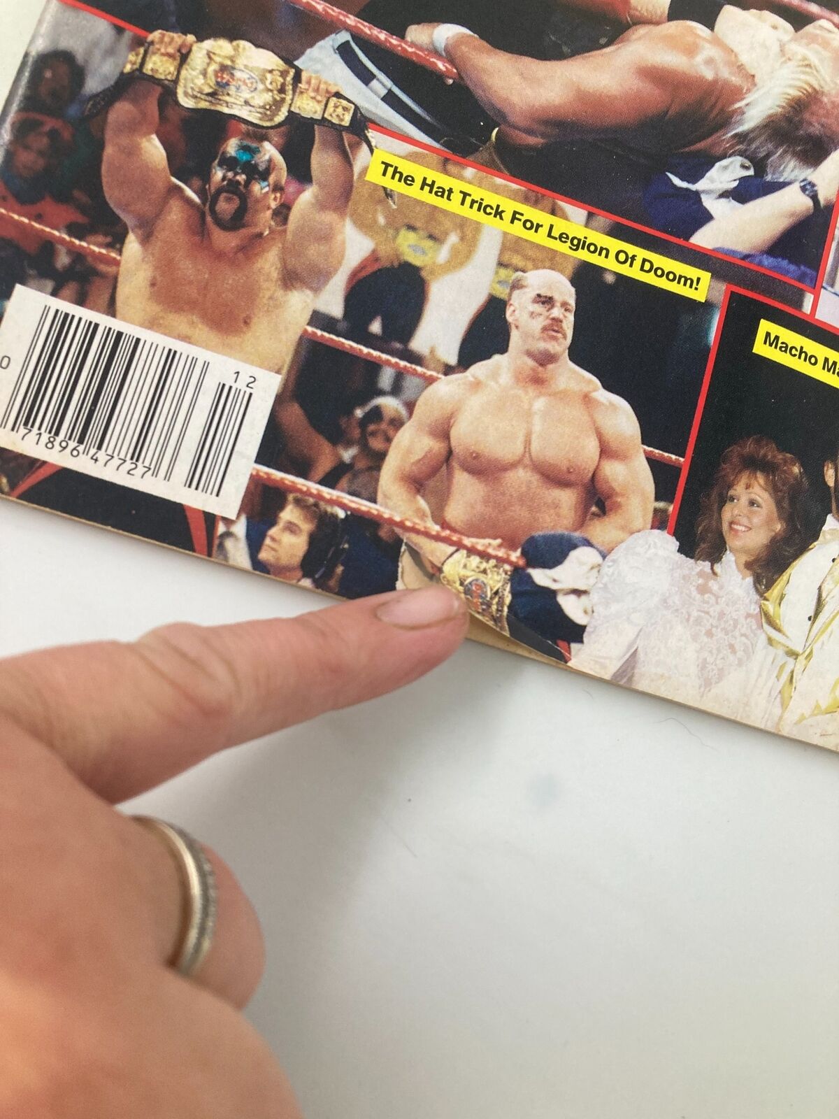 Inside Wrestling Magazine December 1991 back cover showcasing wrestling talents, including a wrestler displaying a championship belt, with promotional highlights for the magazine's features.