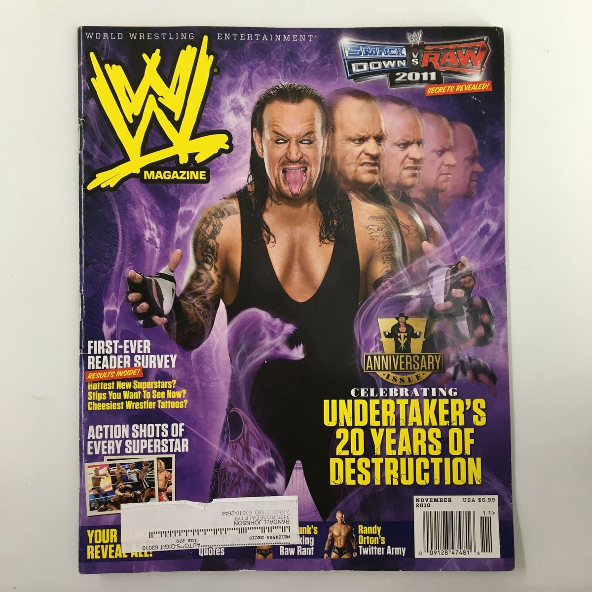 WWE Magazine November 2010 featuring The Undertaker on the cover, celebrating 20 years of destruction, with a vibrant purple background and several wrestlers in the background.