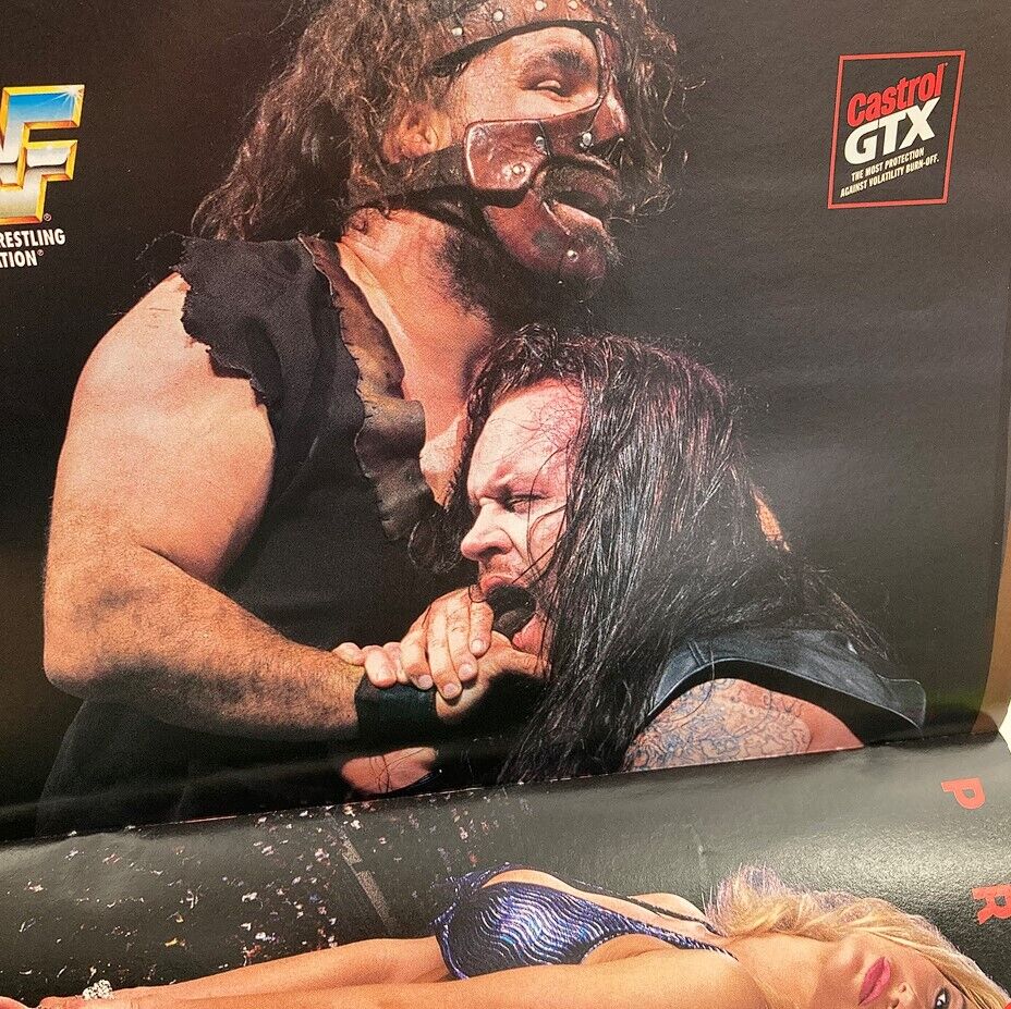 A dramatic image from WWF World Wrestling Federation Magazine May 1997 depicting an intense wrestling matchup, capturing the raw energy of the sport.
