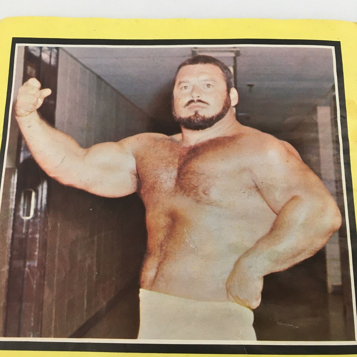 Wrestling Action Magazine Vol 1 #4 - Photograph of a muscular wrestler posing confidently, emphasizing the athleticism and charisma common in the 1970s wrestling scene.