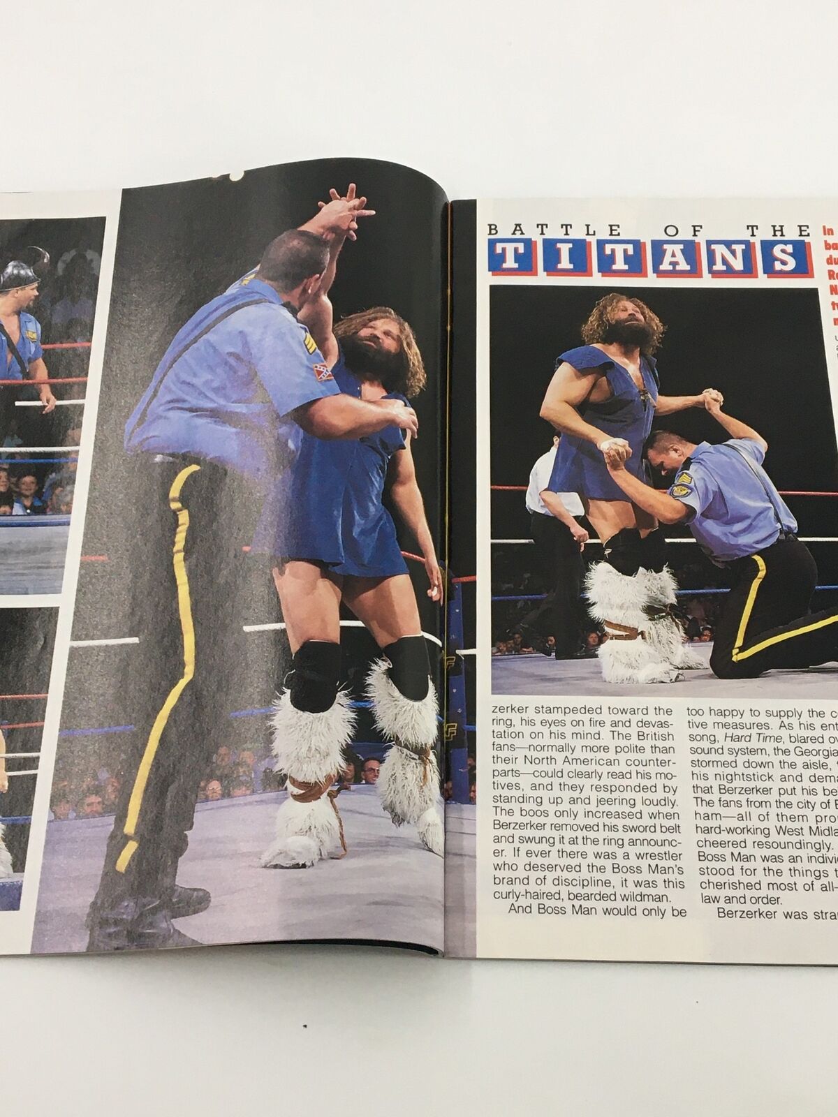 WWF Magazine August 1992 Battle of the Titans segment illustrating a wrestling match in action, capturing the intensity and excitement of the sport.