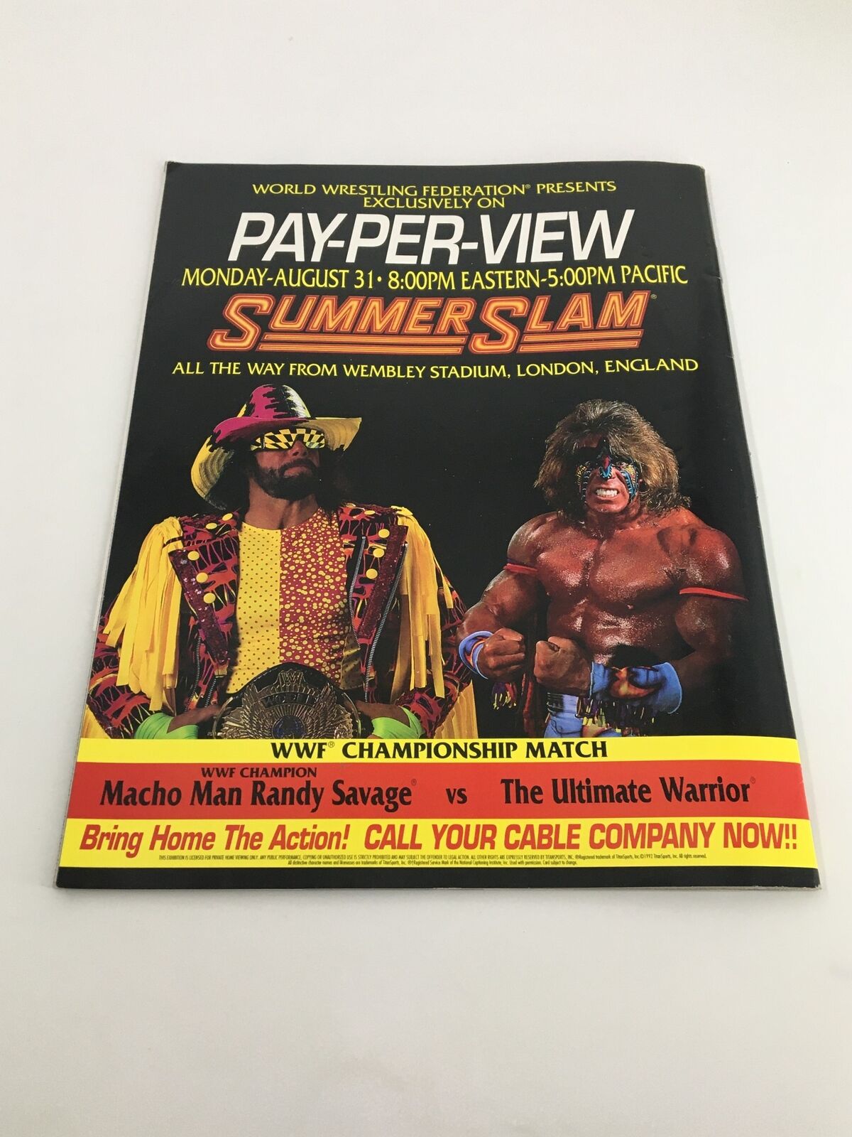 Cover of WWF Magazine August 1992 featuring promotional art for the Pay-Per-View event SummerSlam, showcasing Macho Man Randy Savage and The Ultimate Warrior.