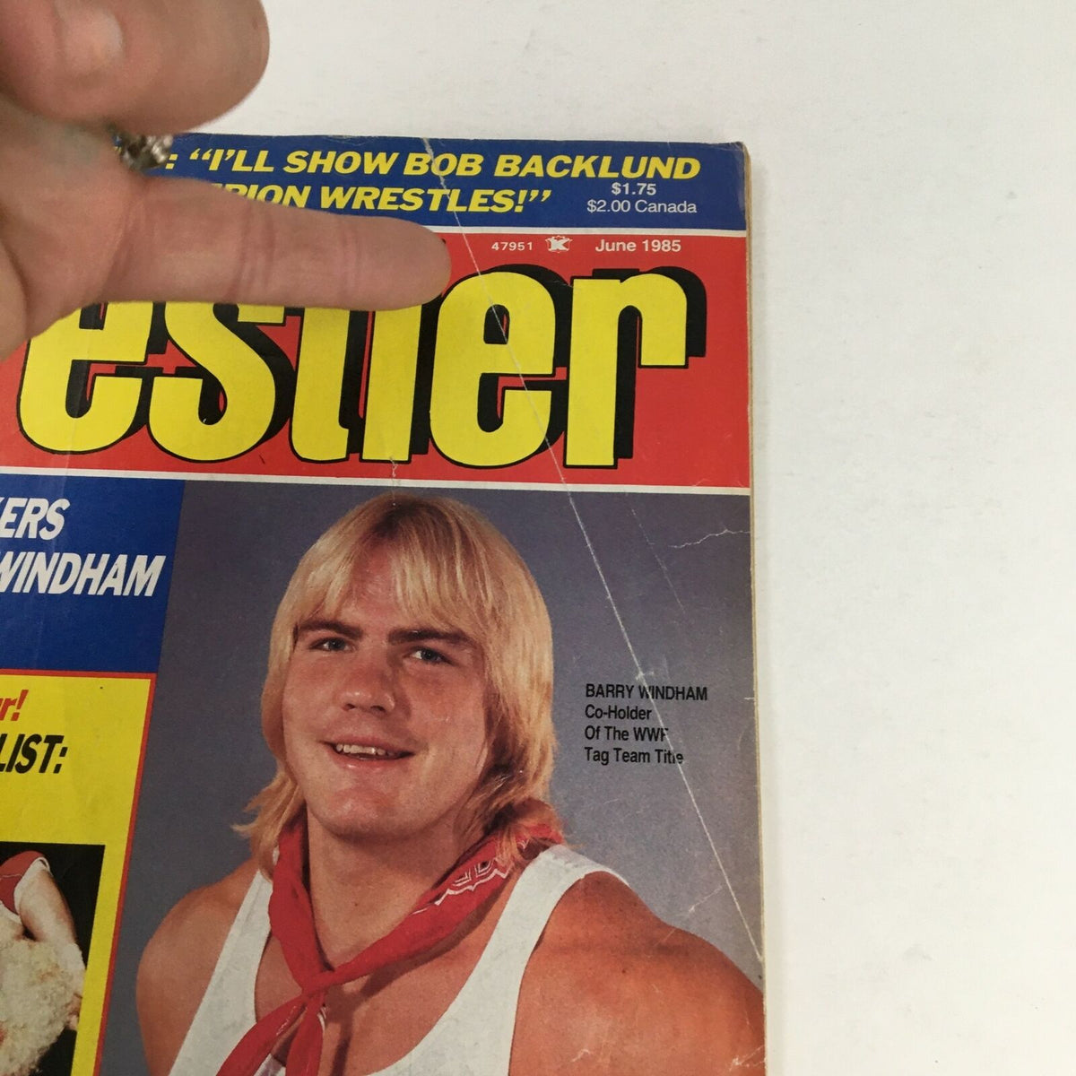 Close-up of The Wrestler Magazine June 1985 cover, highlighting Barry Windham, co-holder of the WWF Tag Team Title, and key headlines from that issue.