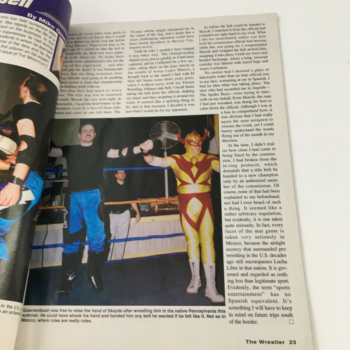 Another inside page from The Wrestler Magazine May 2004 showcasing wrestlers in action during a match, highlighting the vibrant atmosphere and dynamic styles of wrestling personalities from the era.