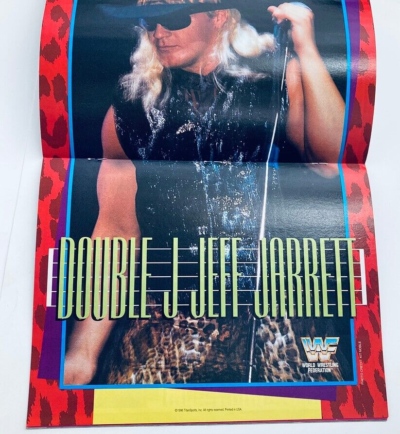 WWF World Wrestling Federation Magazine May 1996 featuring Jeff Jarrett in a vibrant poster display with bold text. Vintage wrestling collectible showcasing the iconic figure in a stylish outfit, perfect for wrestling fans and collectors.
