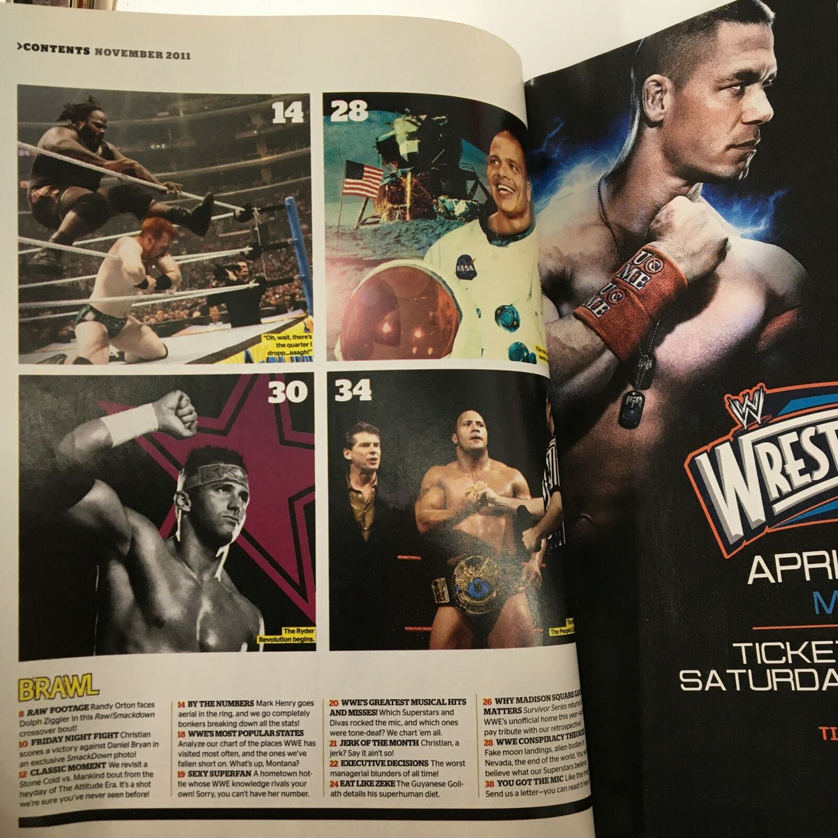WWE Magazine November 2011 featuring action-packed wrestling scenes, including Triple H, John Cena, and Randy Orton. Highlights include contents from the issue and interviews with iconic wrestling stars.