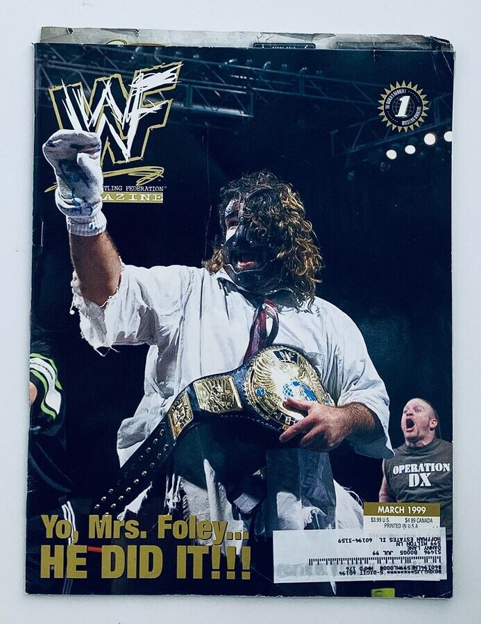 WWF World Wrestling Federation Magazine March 1999 featuring Mick Foley on the cover, celebrating his championship win with a championship belt.