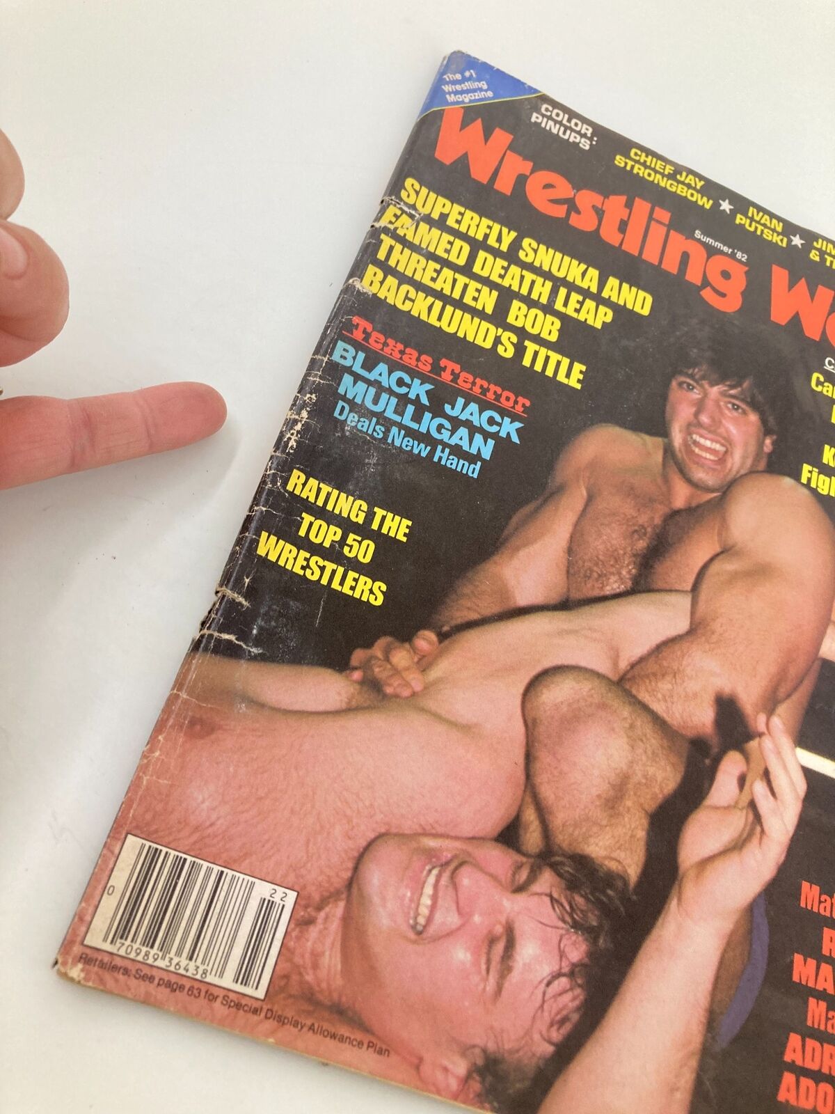 Close-up of the cover of VTG Wrestling World Magazine Summer 1982, showcasing Jimmy Snuka and Bob Backlund, with text about wrestling matches.