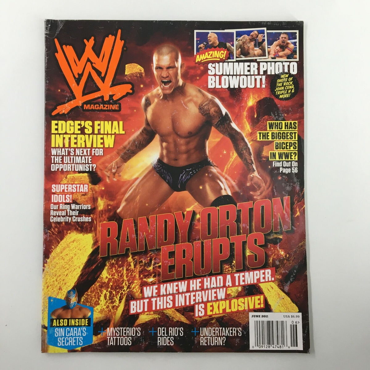 Cover of WWE Magazine June 2011 featuring Randy Orton in a dramatic pose with fiery background, highlighting his explosive character. The magazine includes features on Rey Mysterio, Sin Cara, and The Rock.