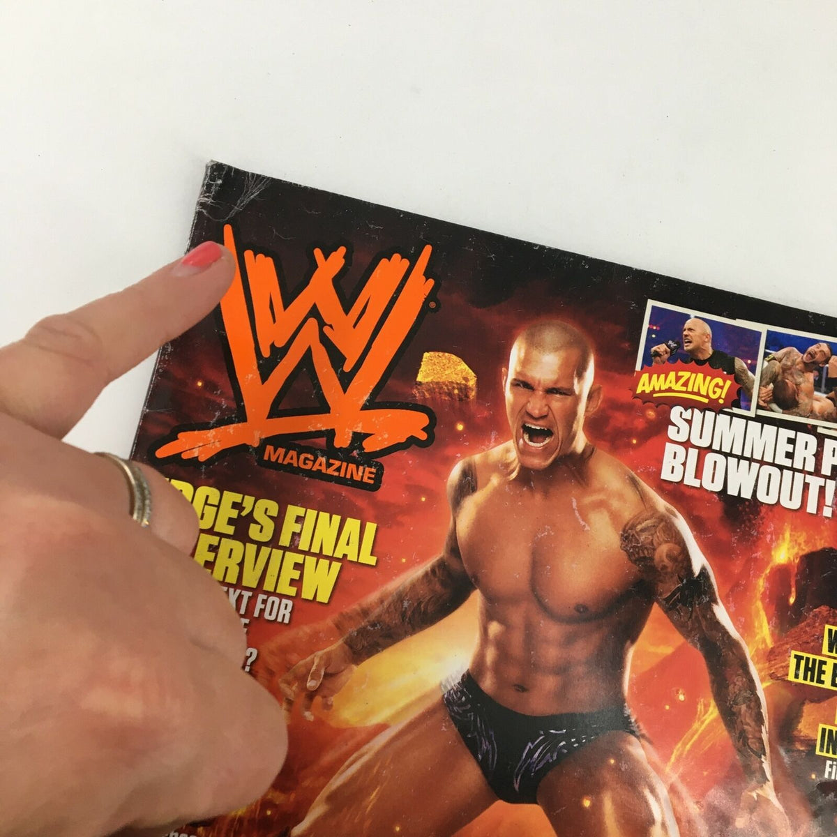 Close-up of WWE Magazine June 2011 cover showing Randy Orton, emphasizing the magazine's title and details about the final interview with Edge along with engaging graphics.