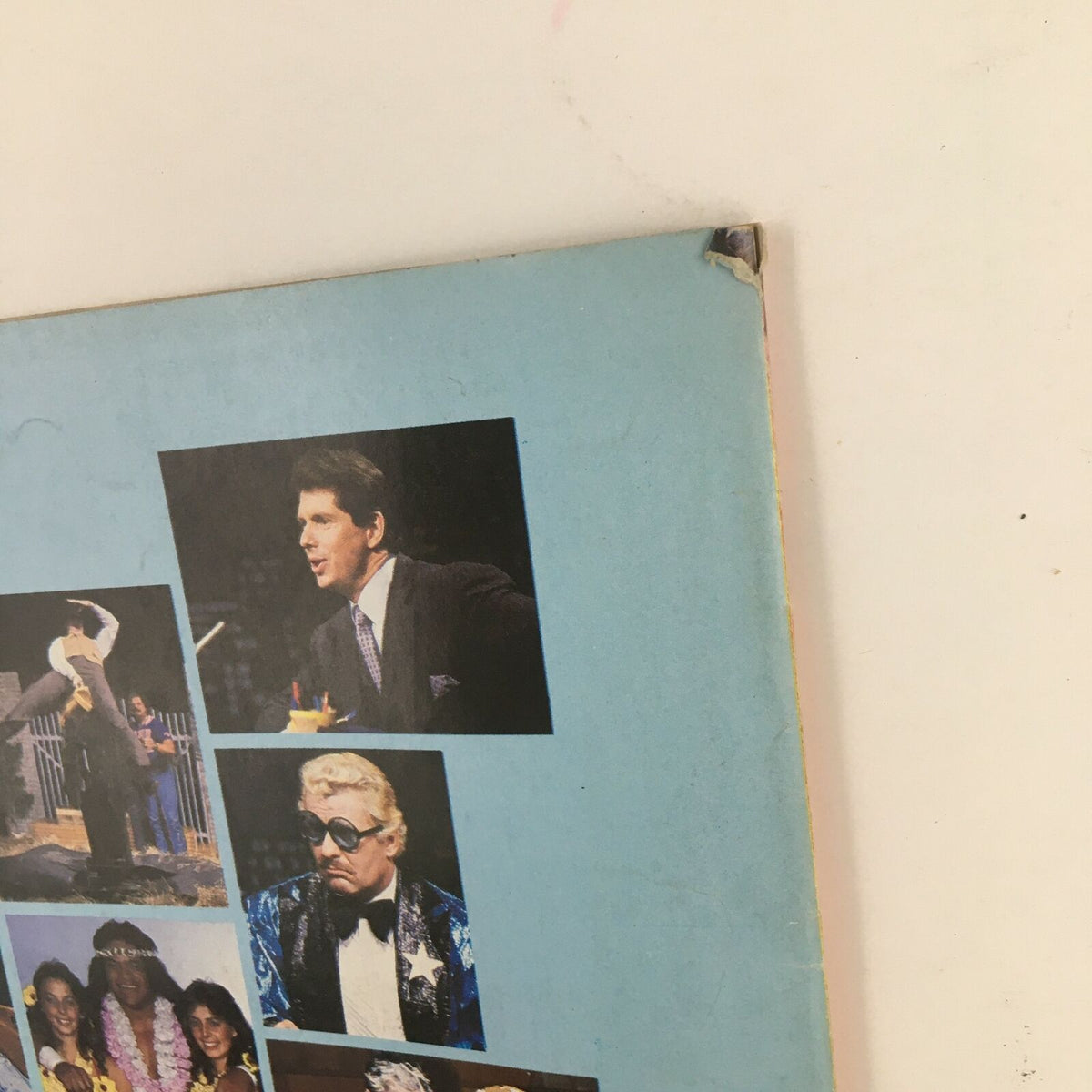 Close-up of the back cover of WWF Magazine August 1985, showcasing iconic moments from wrestling history and famous personalities.