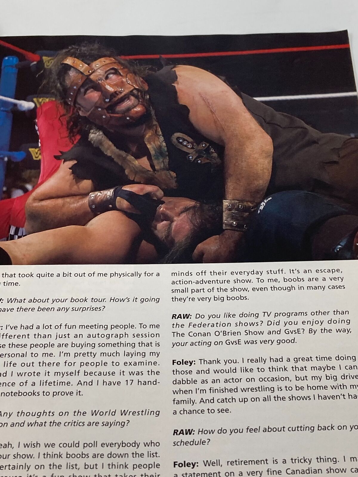 WWF Raw Magazine February 2000 featuring Mick Foley, showcasing an intense wrestling match scene with dramatic action, perfect for collectors and fans of wrestling history.