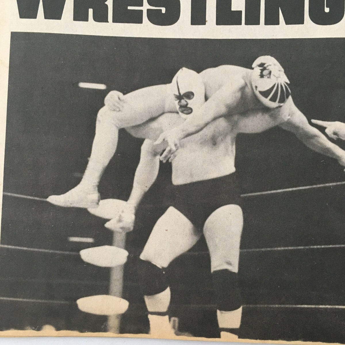 Vintage wrestling scene featuring a dramatic moment from Sports Review Wrestling Magazine September 1981, showcasing the iconic match between Ric Flair and Harley Race for the NWA Championship.