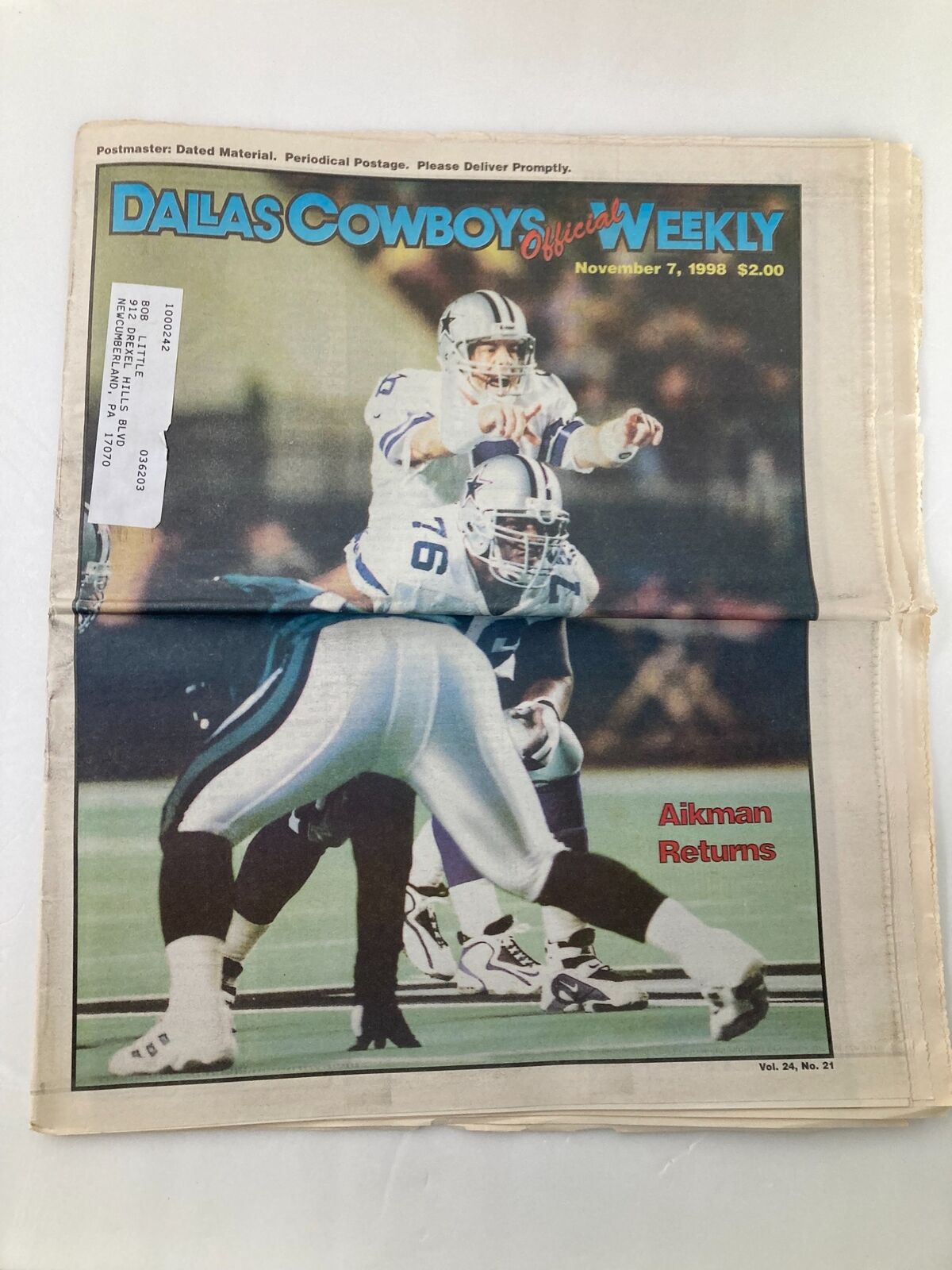 Dallas Cowboys Weekly Newspaper from November 7, 1998, featuring Troy Aikman Returns on the cover, showcasing players in action during a football game.