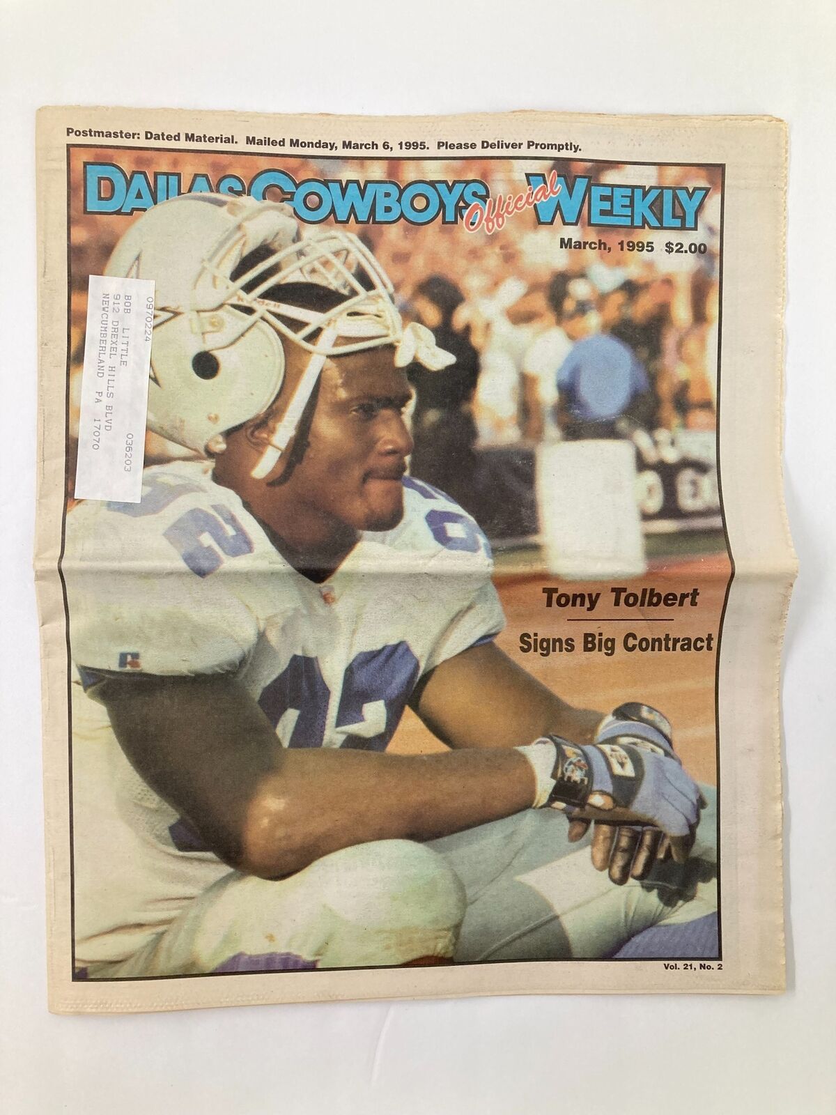 Cover of Dallas Cowboys Weekly Newspaper from March 1995 featuring Tony Tolbert, highlighting his big contract announcement, Vol 21 #2.