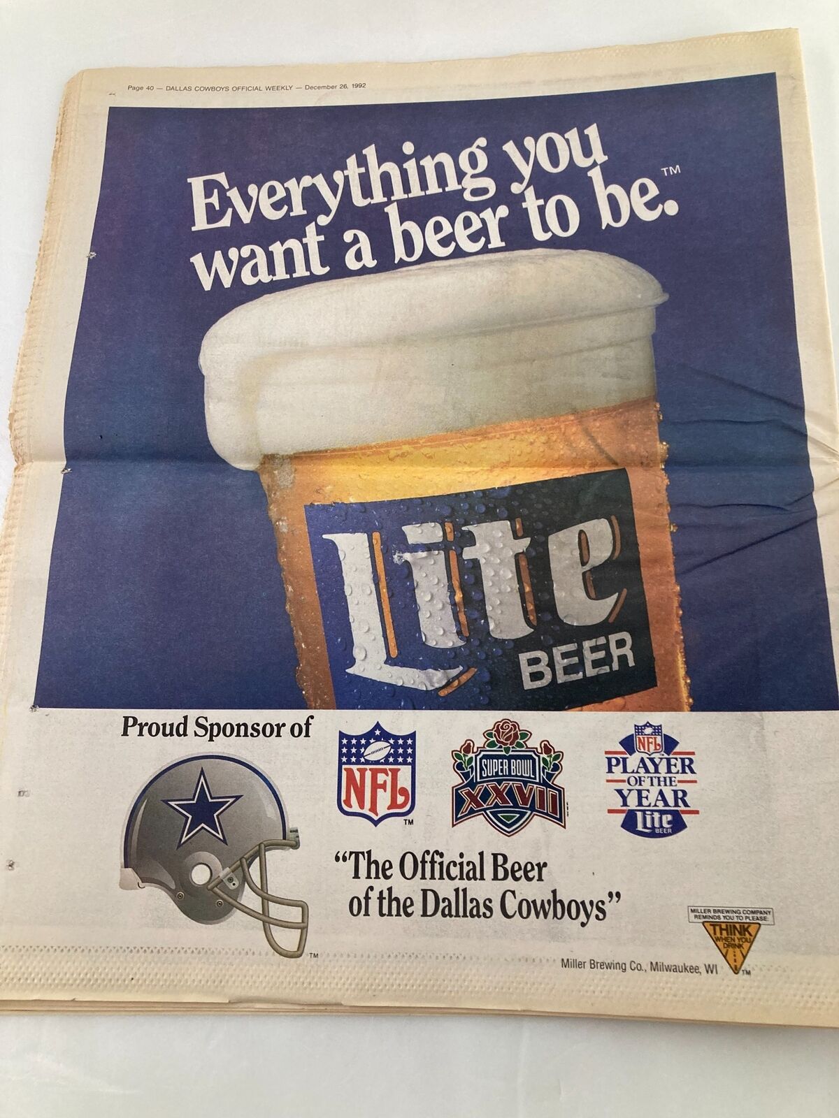 Dallas Cowboys Weekly Newspaper December 26 1992 Vol 19 #28 Tony Tolbert advertisement page showcasing Lite Beer as the official beer sponsor of the Dallas Cowboys, emphasizing the brand's connection to the NFL.
