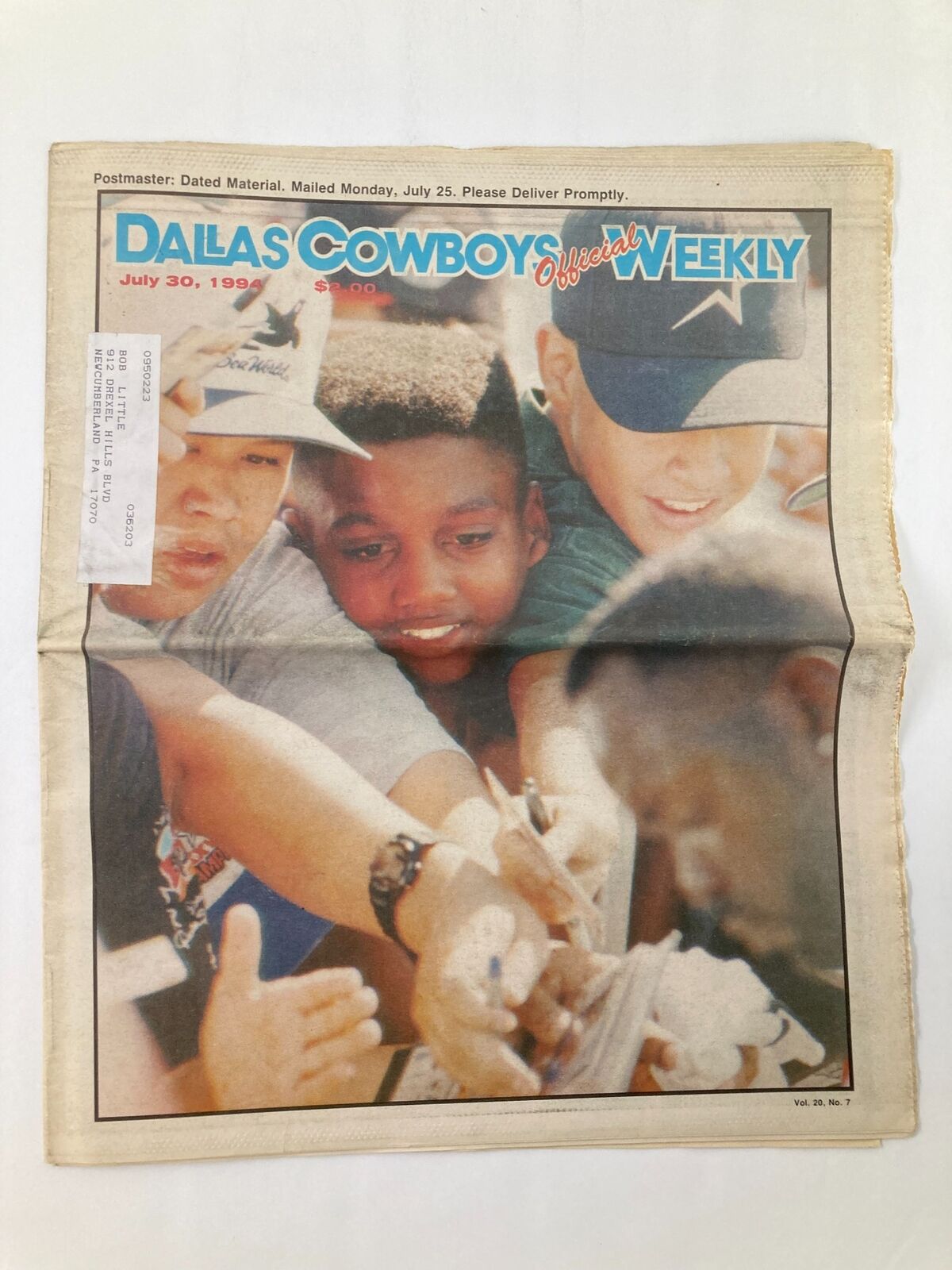 Dallas Cowboys Weekly Newspaper July 30 1994 Vol 20 #7 cover image featuring fans getting autographs at Training Camp.