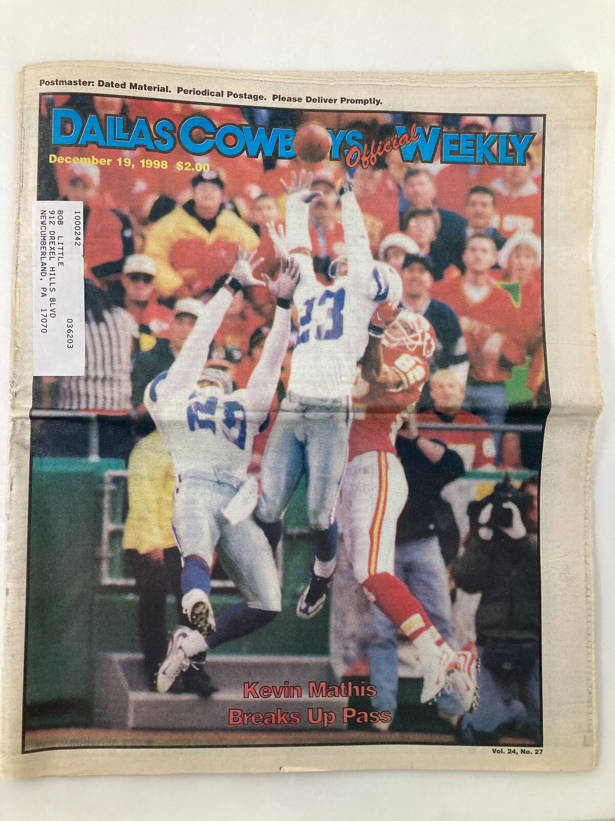Cover of Dallas Cowboys Weekly newspaper from December 19, 1998, featuring Kevin Mathis breaking up a pass.