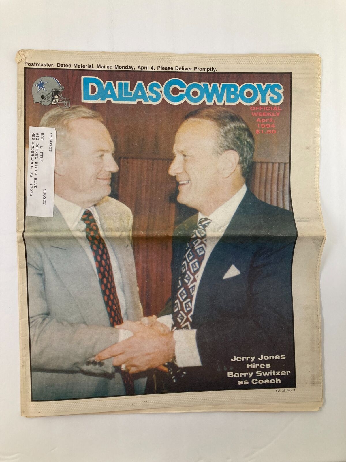 Dallas Cowboys Weekly Newspaper cover from April 1994, featuring Jerry Jones and Barry Switzer shaking hands, highlighting the hiring of Switzer as coach.