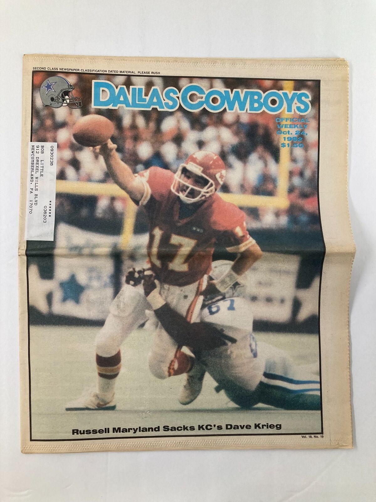 Front cover of Dallas Cowboys Weekly Newspaper October 24 1992 Vol 18 #19 showcasing Russell Maryland tackling KC's Dave Krieg.