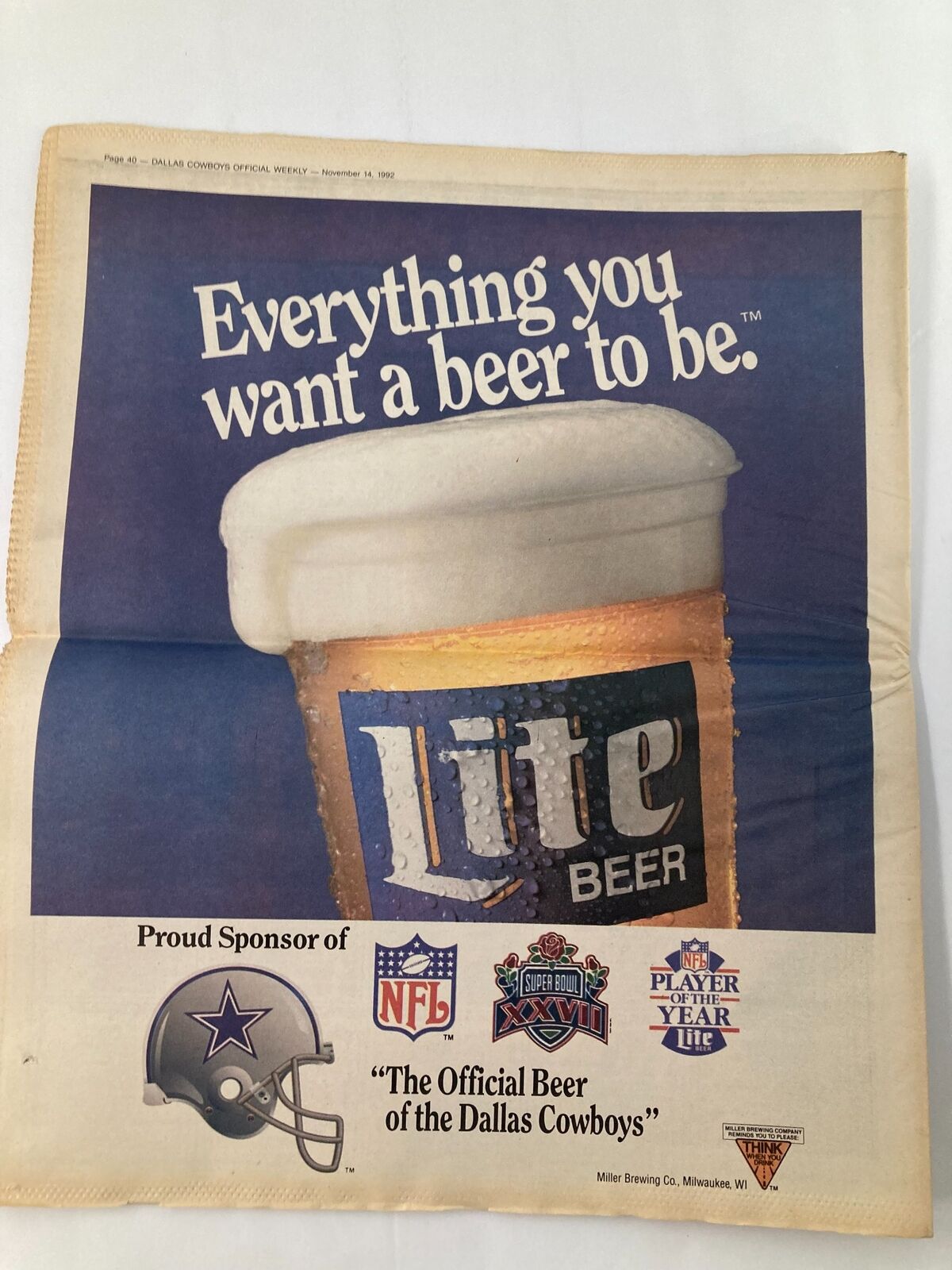 Dallas Cowboys Weekly Newspaper November 14 1992 displaying the Lite Beer advertisement, highlighting its sponsorship of the NFL and its association with the Dallas Cowboys.