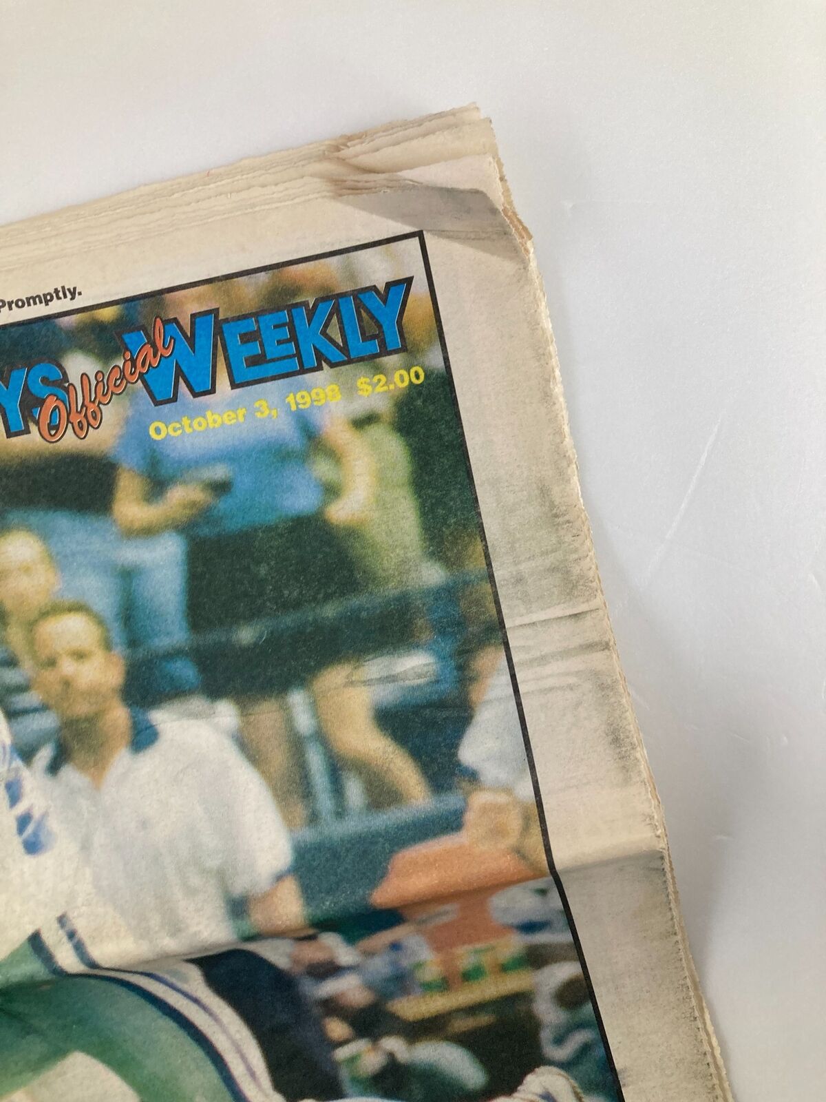 Close-up of the Dallas Cowboys Weekly Newspaper October 3 1998 Vol 24 #16 highlighting the title and date, with minor wear visible on the edges.
